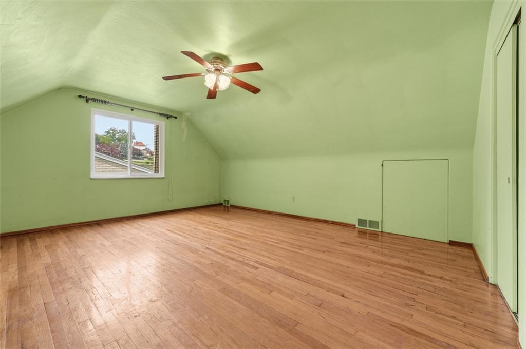 328 Ruthwood Avenue Pittsburgh, PA 15227 - Photo 18 of 32 an empty room with wooden floor closet and windows