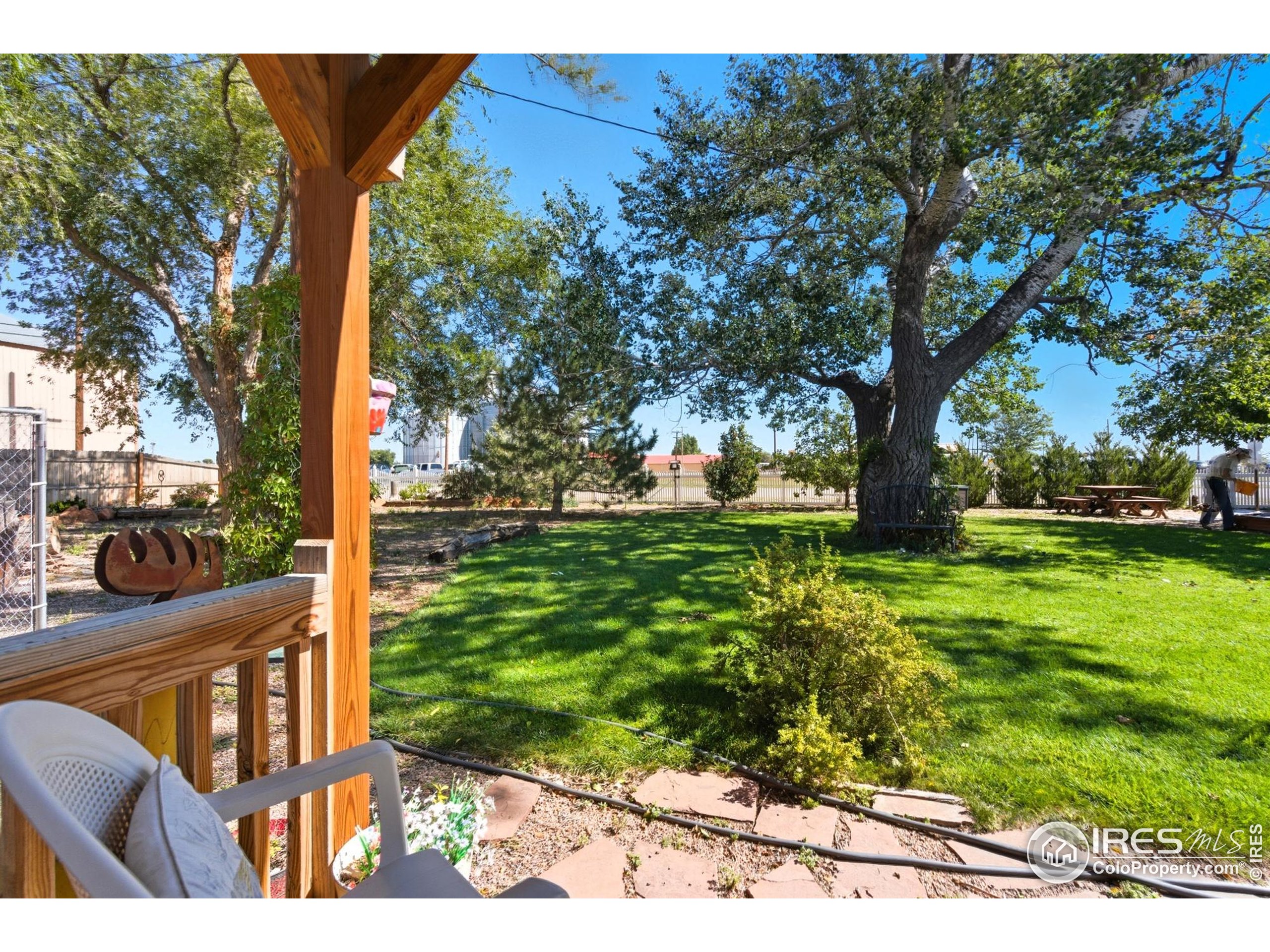 103 West Main Street Pierce, CO 80650 - Photo 25 of 47 a view of outdoor space with garden