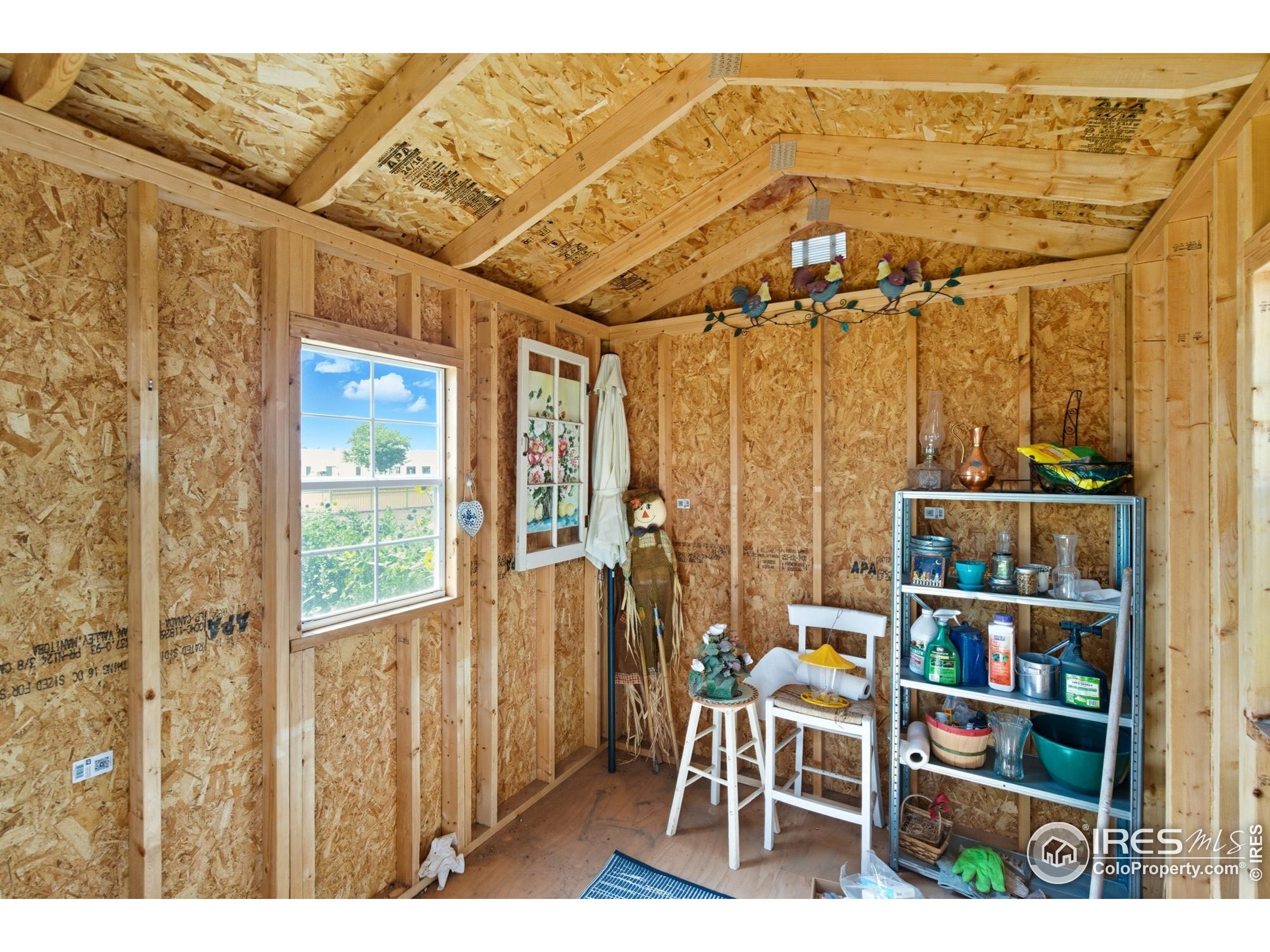 103 West Main Street Pierce, CO 80650 - Photo 30 of 47 a view of a living room and a window