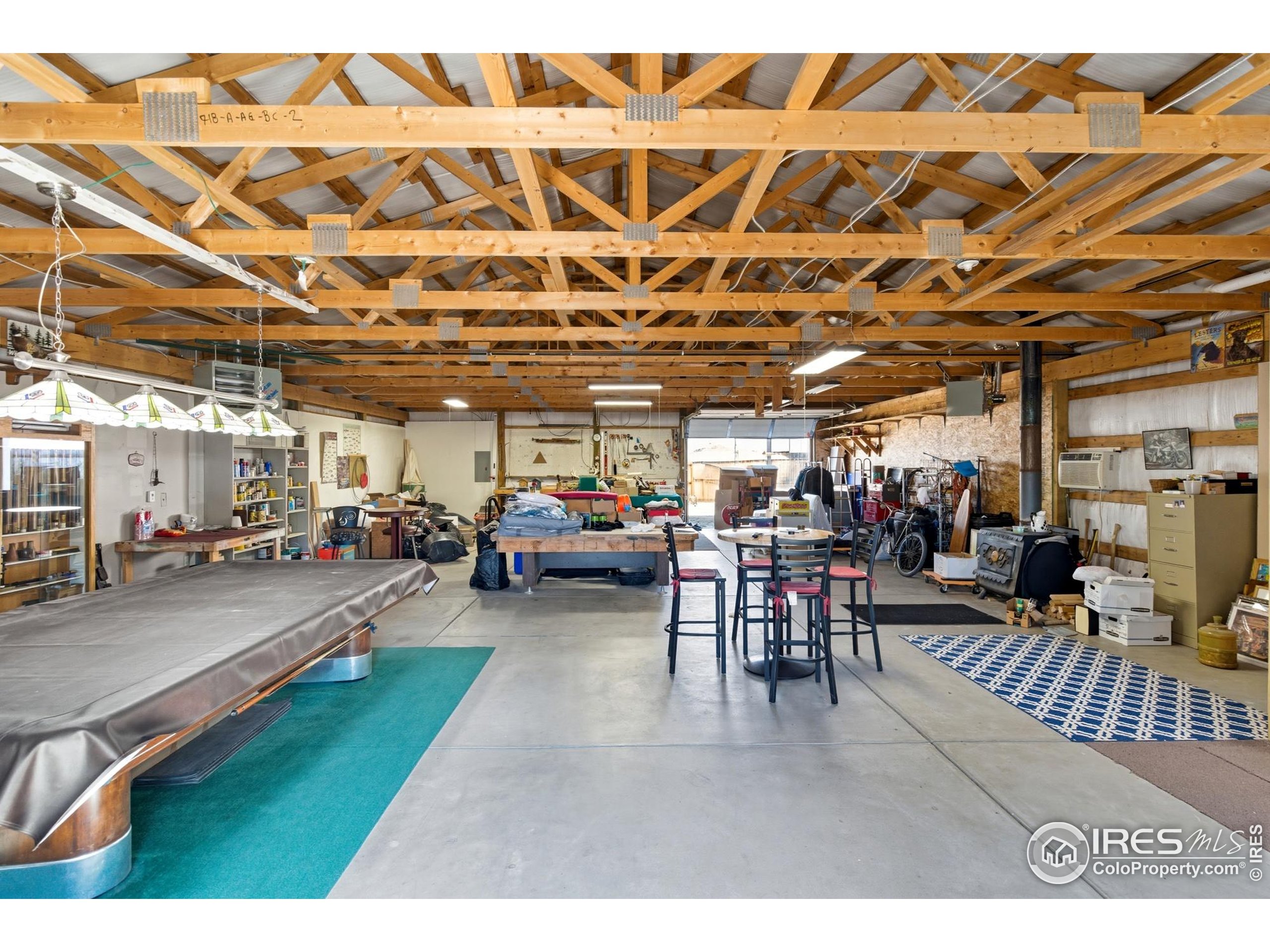 103 West Main Street Pierce, CO 80650 - Photo 33 of 47 a view of a studio with wooden floor