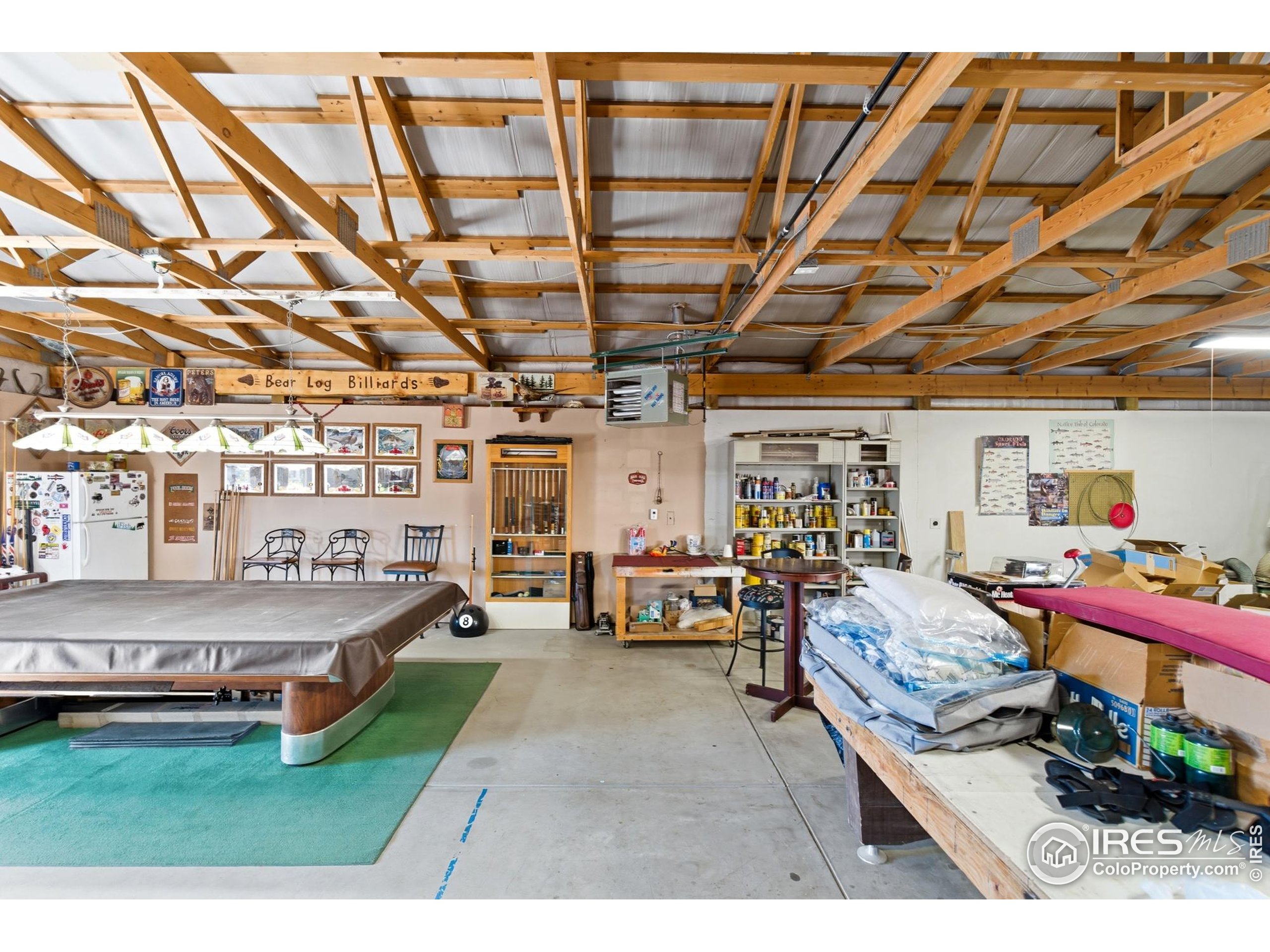 103 West Main Street Pierce, CO 80650 - Photo 35 of 47 a garage with furniture