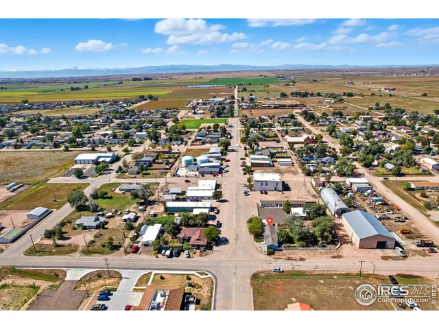 a view of city with ocean