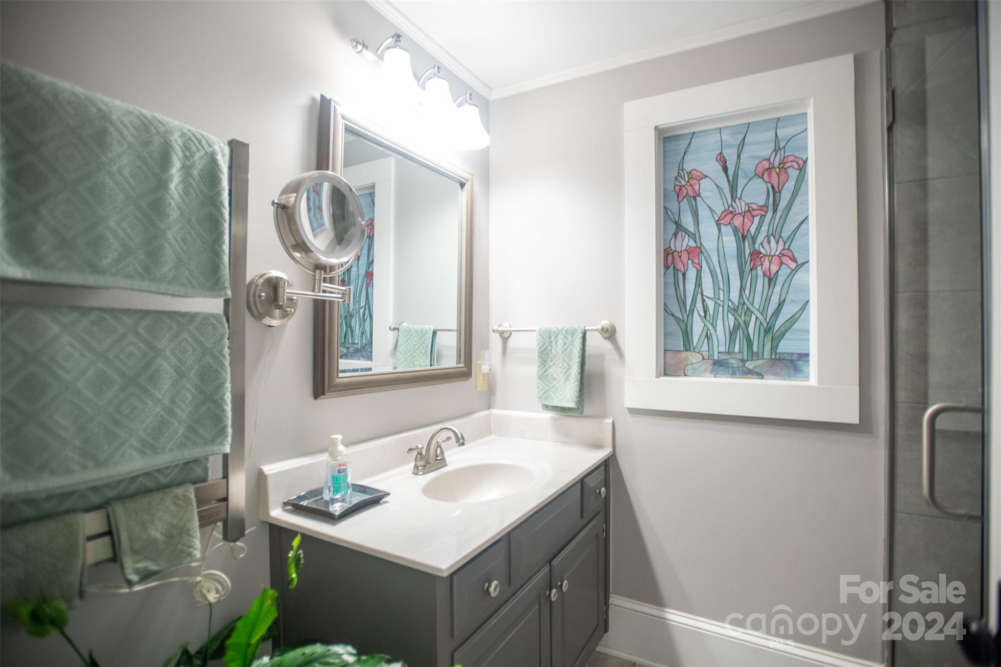 296 Sparks Road Bakersville, NC 28705 - Photo 11 of 47 a bathroom with a sink toilet and a mirror