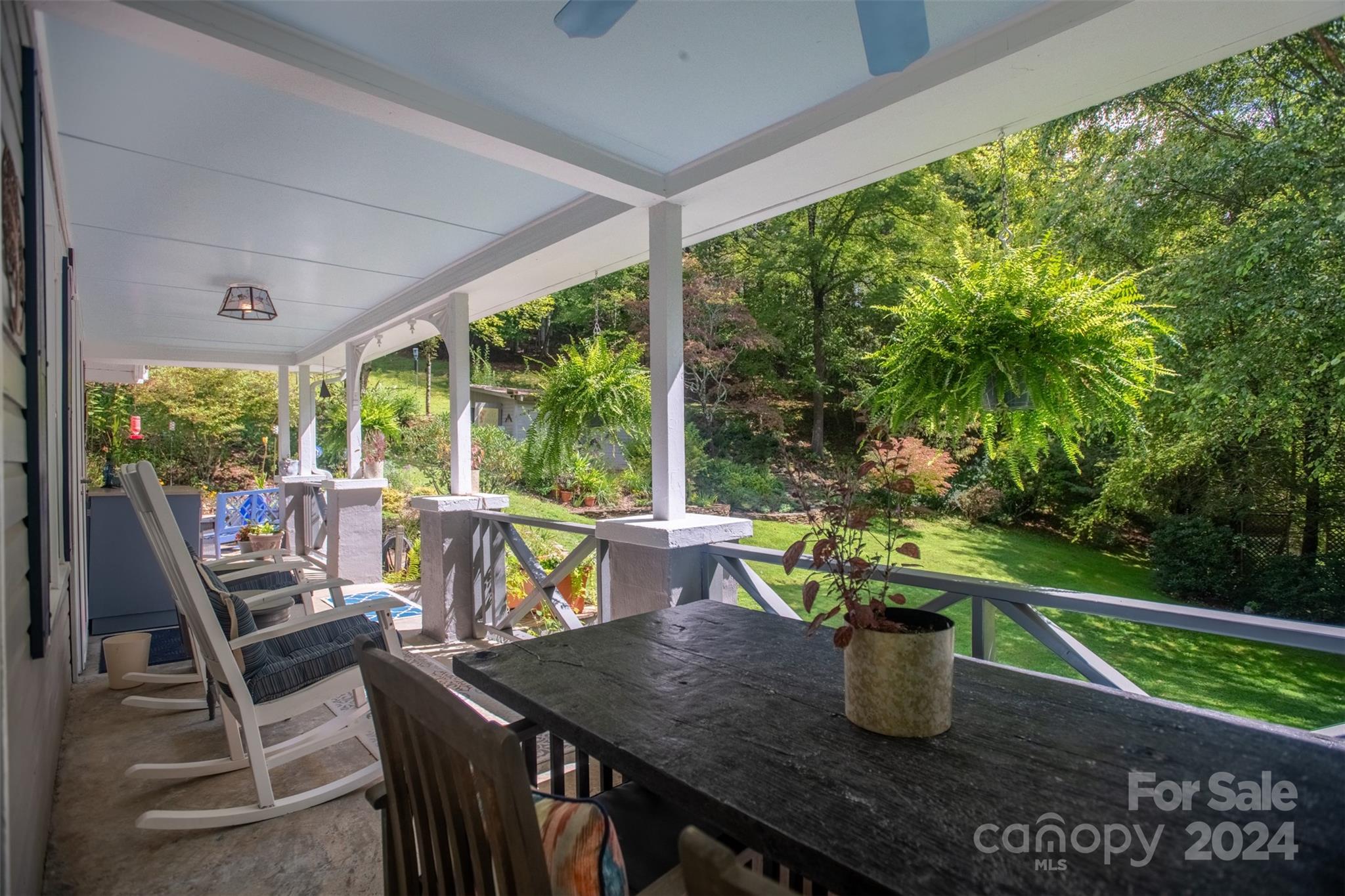 296 Sparks Road Bakersville, NC 28705 - Photo 28 of 47 a view of a dining room with furniture window and outside view