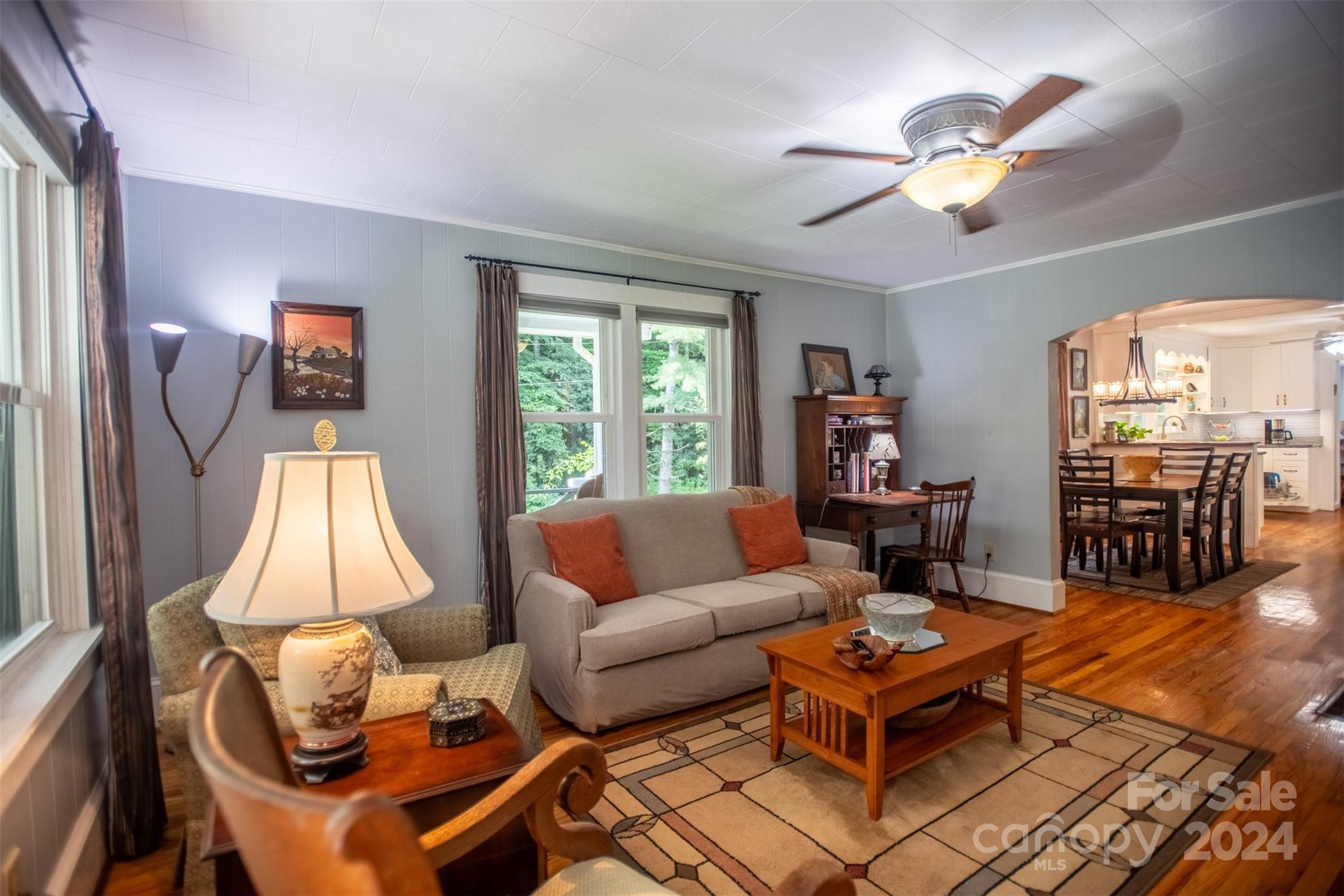 296 Sparks Road Bakersville, NC 28705 - Photo 29 of 47 a living room with furniture a flat screen tv and a window