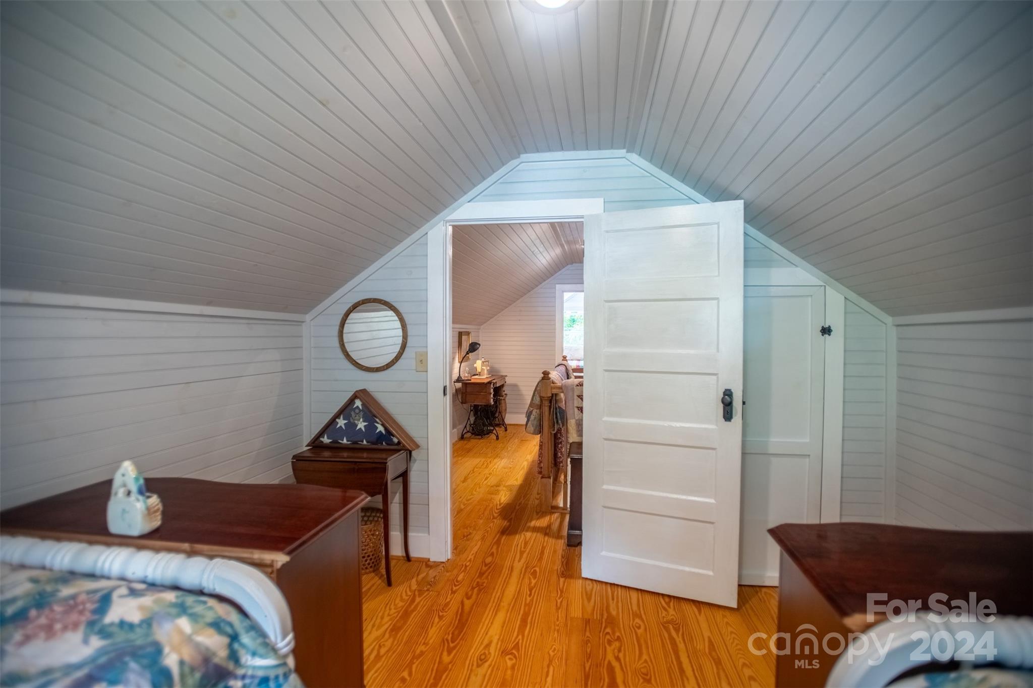 296 Sparks Road Bakersville, NC 28705 - Photo 36 of 47 a bedroom with a bed and a closet