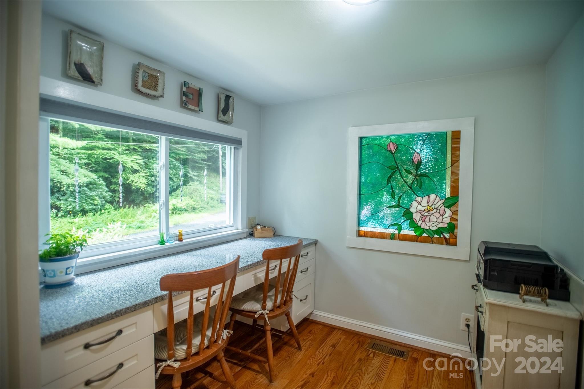 296 Sparks Road Bakersville, NC 28705 - Photo 38 of 47 a view of a workspace with furniture and a window