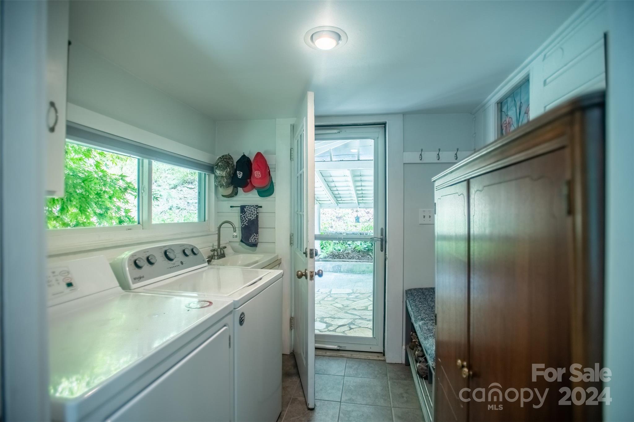 296 Sparks Road Bakersville, NC 28705 - Photo 39 of 47 a utility room with washer and dryer