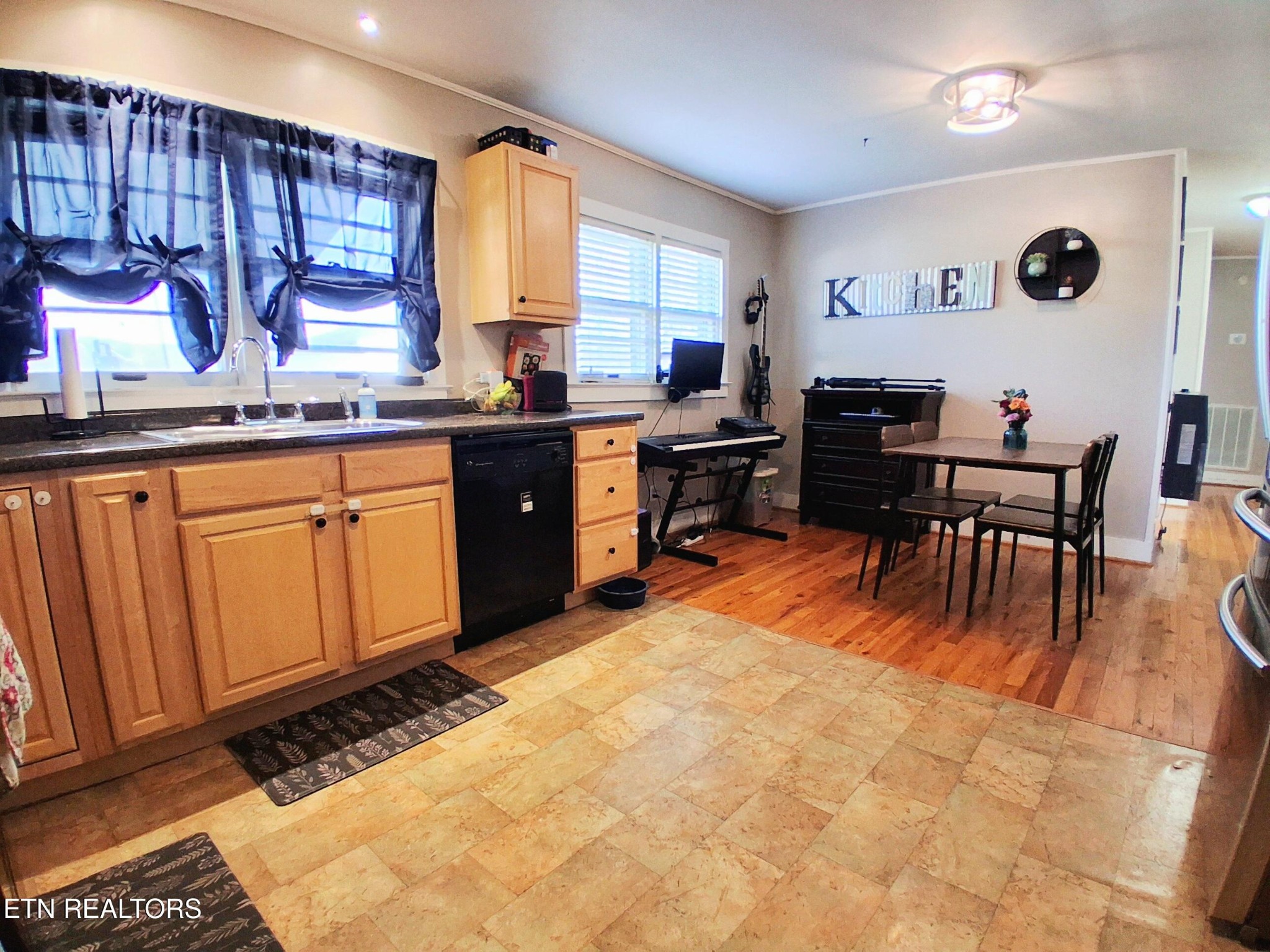 71 Basham Road Morrison, TN 37357 - Photo 6 of 17 a kitchen with stainless steel appliances granite countertop a sink and cabinets