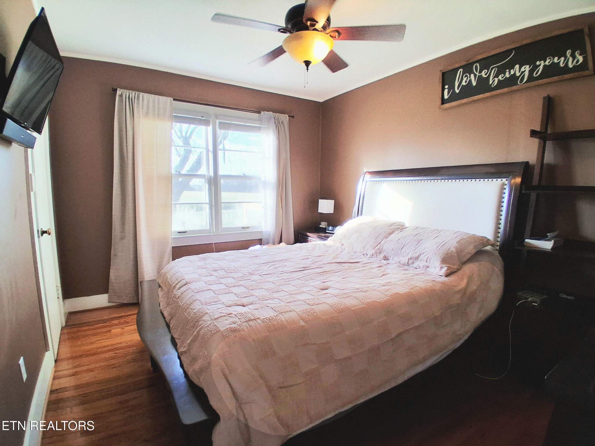71 Basham Road Morrison, TN 37357 - Photo 7 of 17 a bedroom with a bed and a chandelier