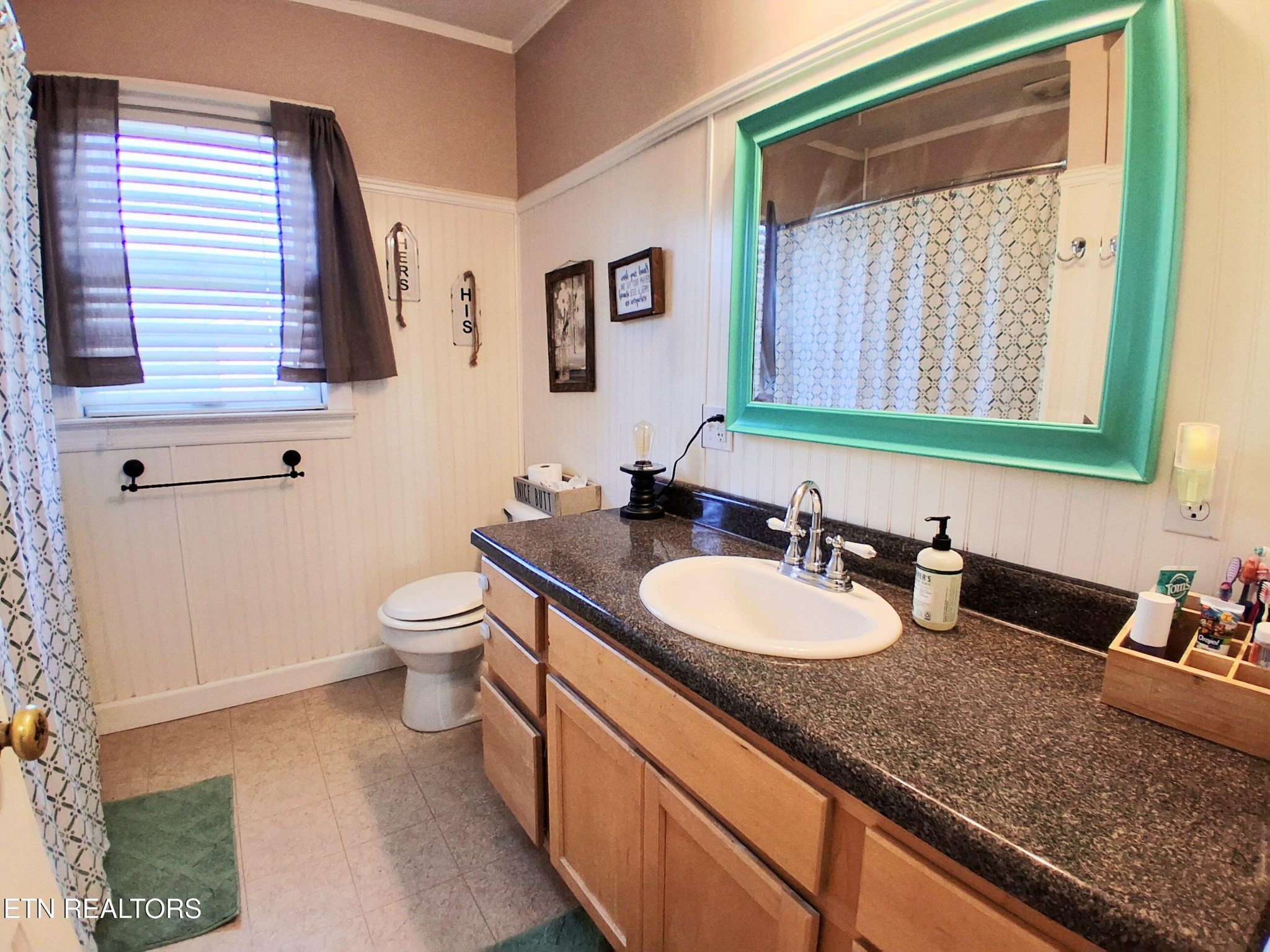 71 Basham Road Morrison, TN 37357 - Photo 9 of 17 a bathroom with a granite countertop toilet sink and mirror