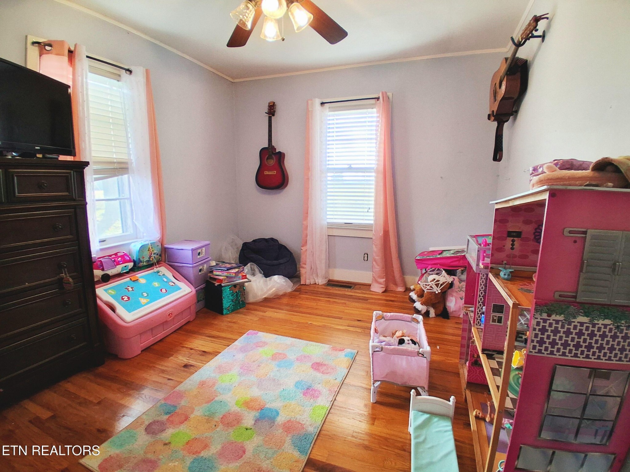 71 Basham Road Morrison, TN 37357 - Photo 10 of 17 a bedroom with furniture and a flat screen tv