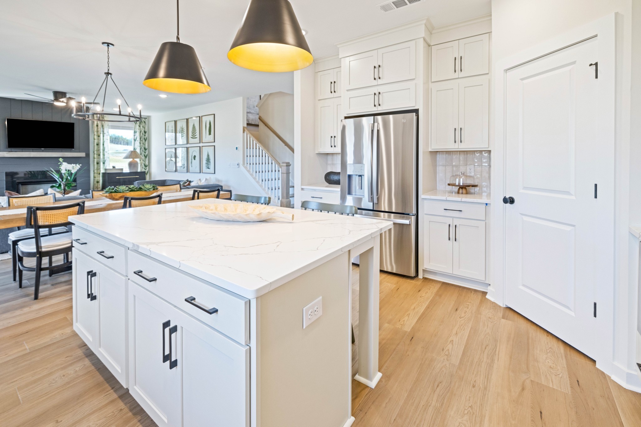 4166 Dream Beetle Loop Rockvale, TN 37153 - Photo 16 of 45 a kitchen with stainless steel appliances a stove a refrigerator and a center island