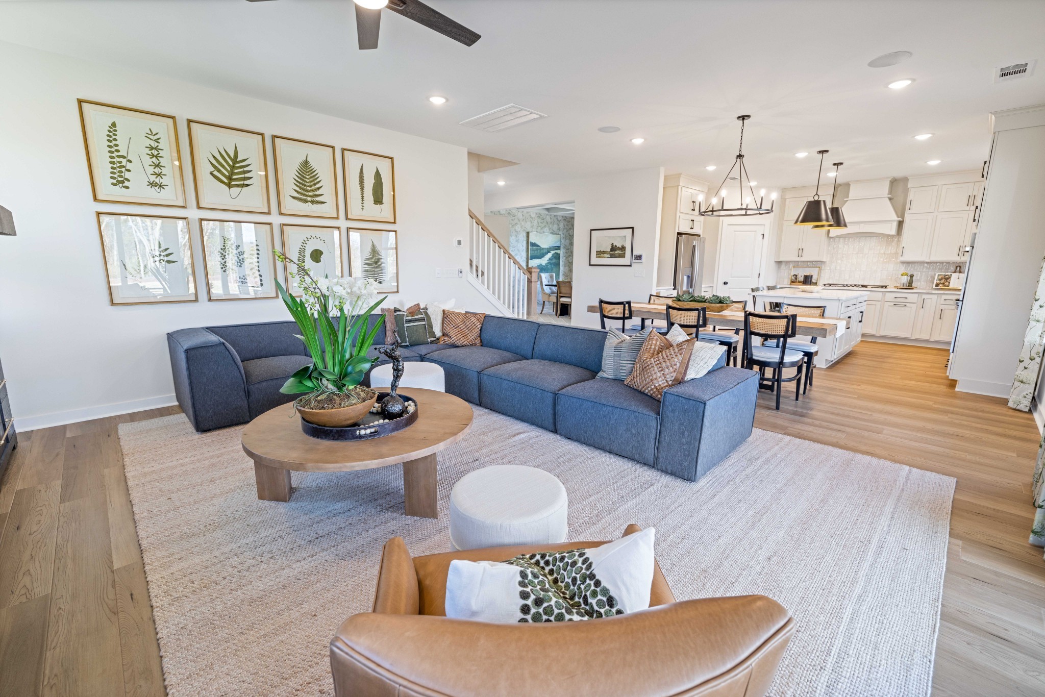 4166 Dream Beetle Loop Rockvale, TN 37153 - Photo 22 of 45 a living room with furniture kitchen view and a wooden floor