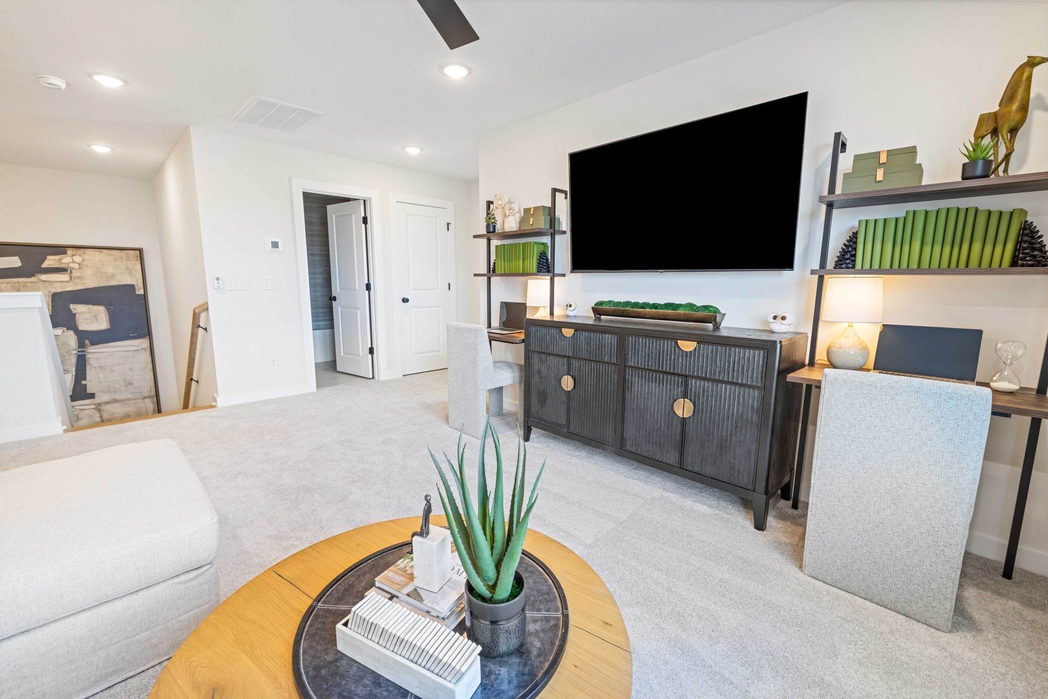 4166 Dream Beetle Loop Rockvale, TN 37153 - Photo 25 of 45 a living room with furniture and a flat screen tv
