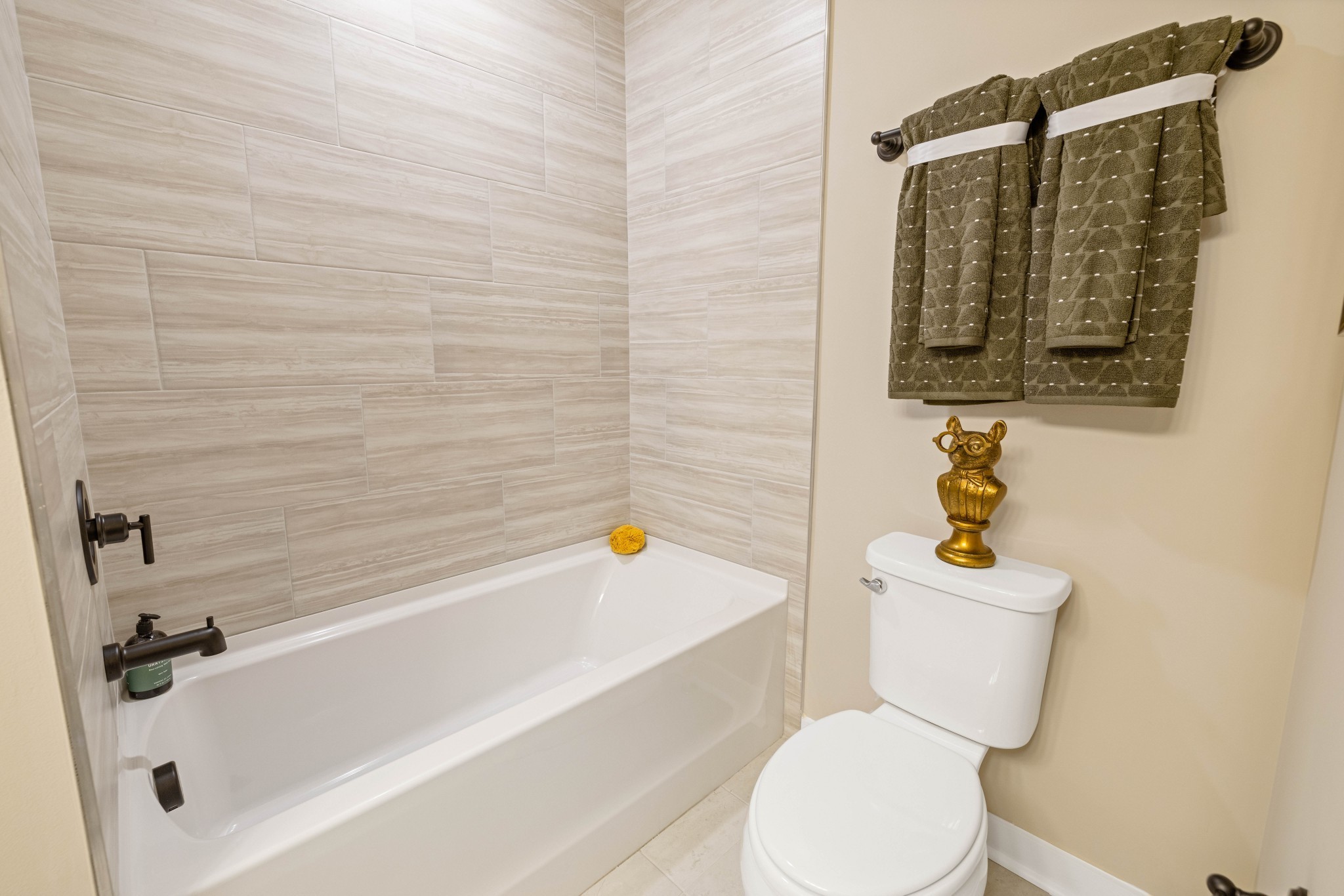 4166 Dream Beetle Loop Rockvale, TN 37153 - Photo 31 of 45 a bathroom with a toilet and a bathtub