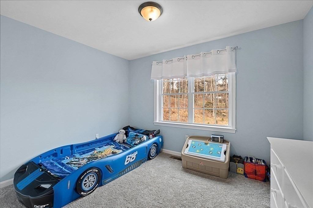 71 Dudley Hill Road Dudley, MA 01571 - Photo 19 of 32 a utility room with a window