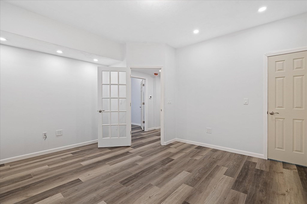 71 Dudley Hill Road Dudley, MA 01571 - Photo 24 of 32 wooden floor in an empty room