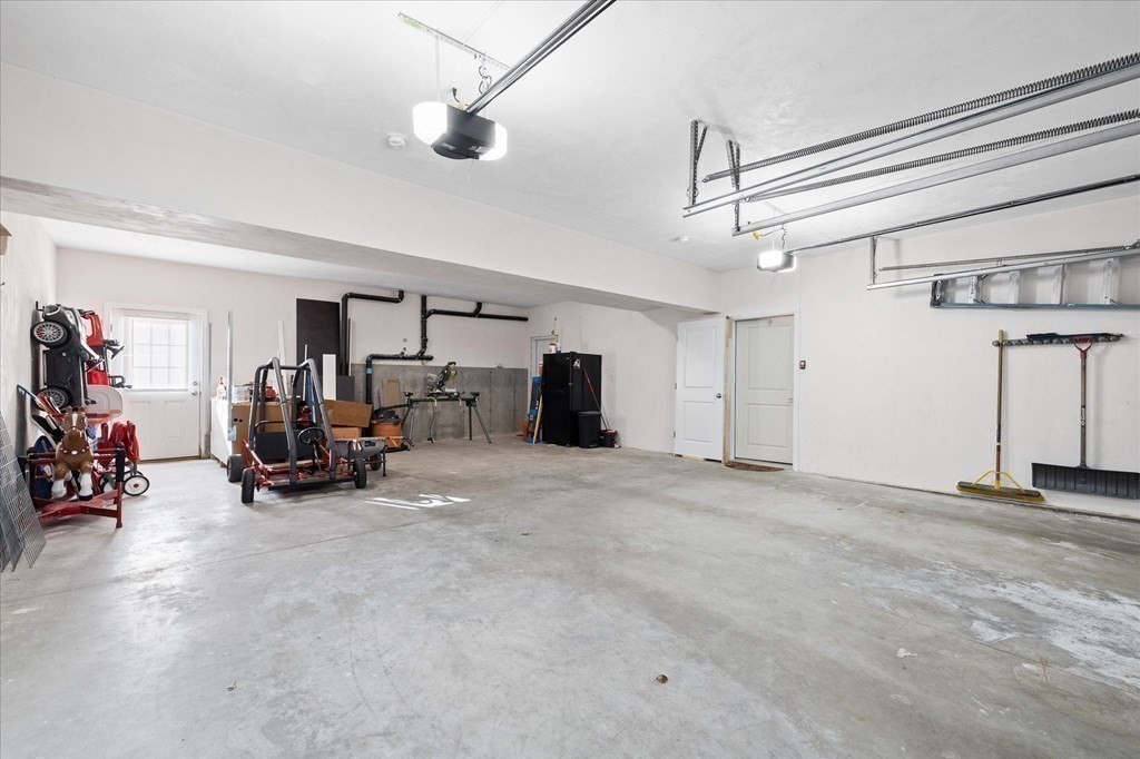 71 Dudley Hill Road Dudley, MA 01571 - Photo 31 of 32 a view of a room with gym equipment