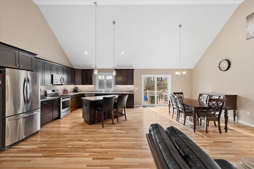 71 Dudley Hill Road Dudley, MA 01571 - Photo 5 of 32 a view of a dining room with furniture window and wooden floor