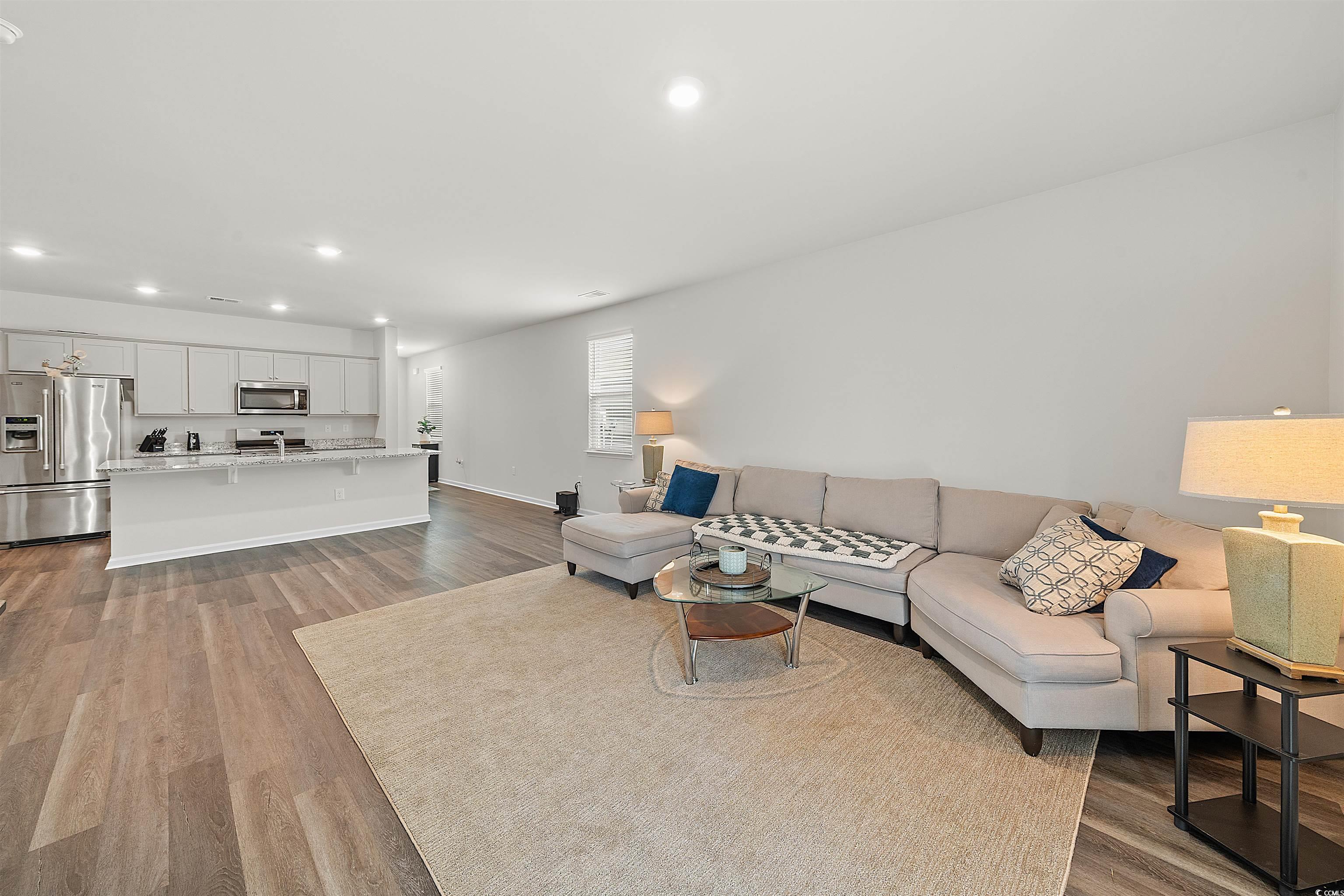 3119 Fair Rdg Way Conway, SC 29526 - Photo 10 of 38 Living room with recessed lighting and dark wood-type flooring