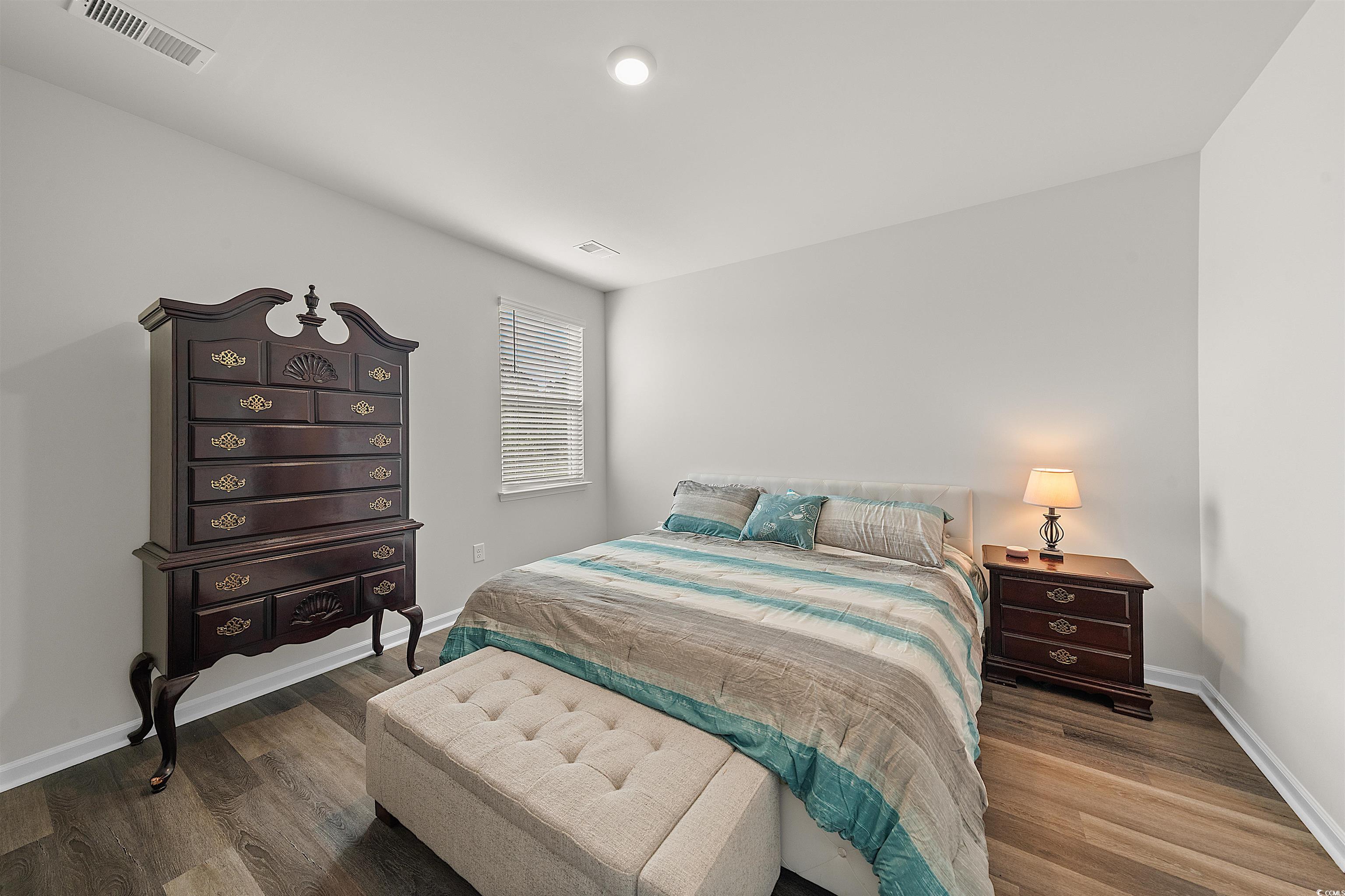 3119 Fair Rdg Way Conway, SC 29526 - Photo 11 of 38 Bedroom with wood finished floors and baseboards