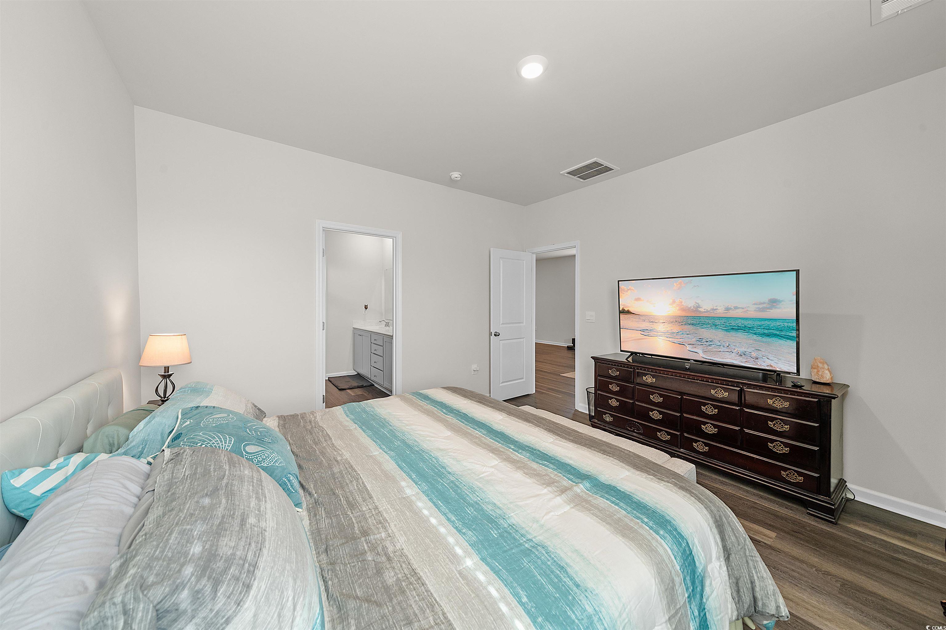 3119 Fair Rdg Way Conway, SC 29526 - Photo 12 of 38 Bedroom featuring dark wood-style floors and ensuite bath