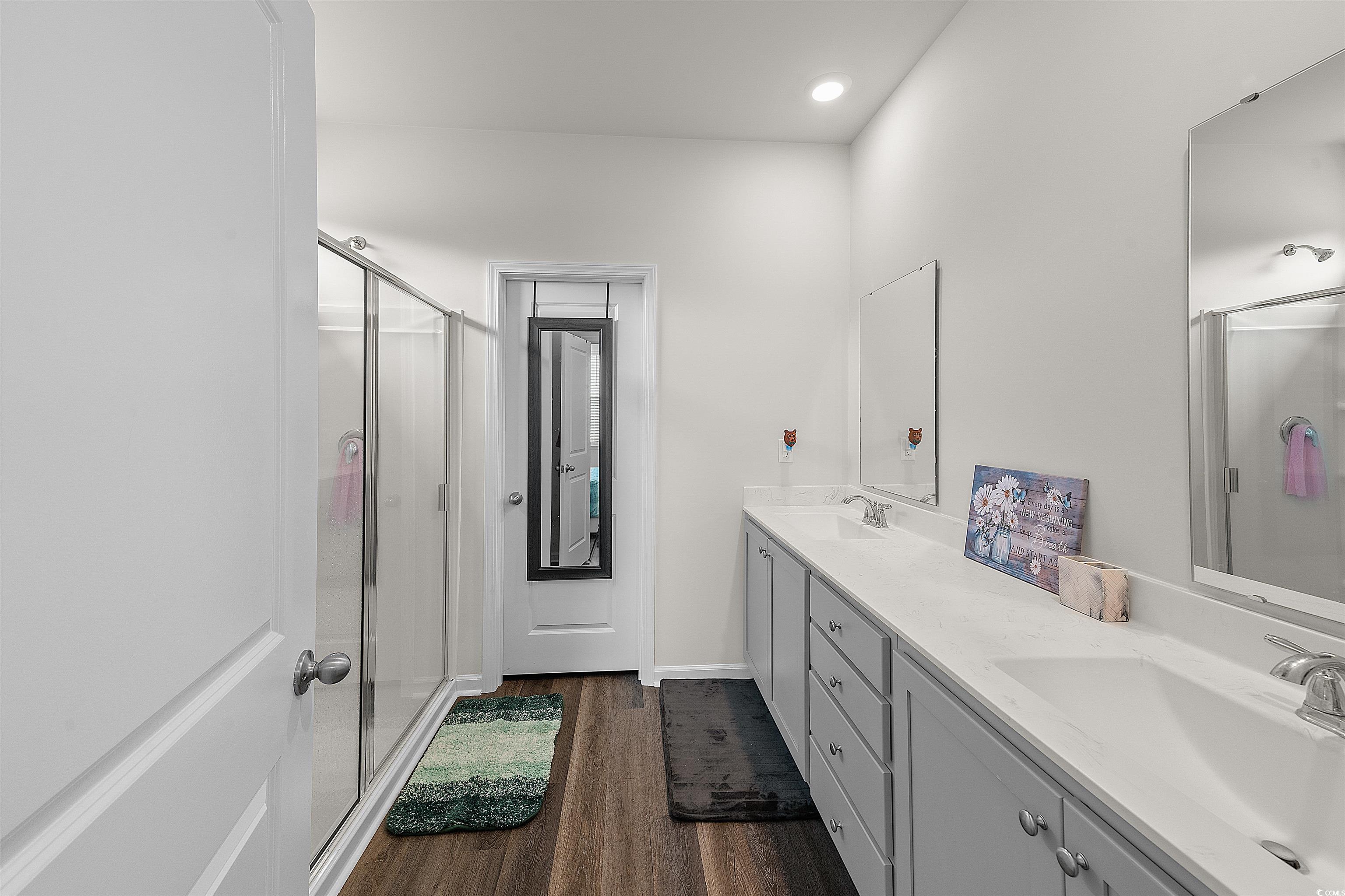 3119 Fair Rdg Way Conway, SC 29526 - Photo 14 of 38 Bathroom with a stall shower, double vanity, wood finished floors, and recessed lighting