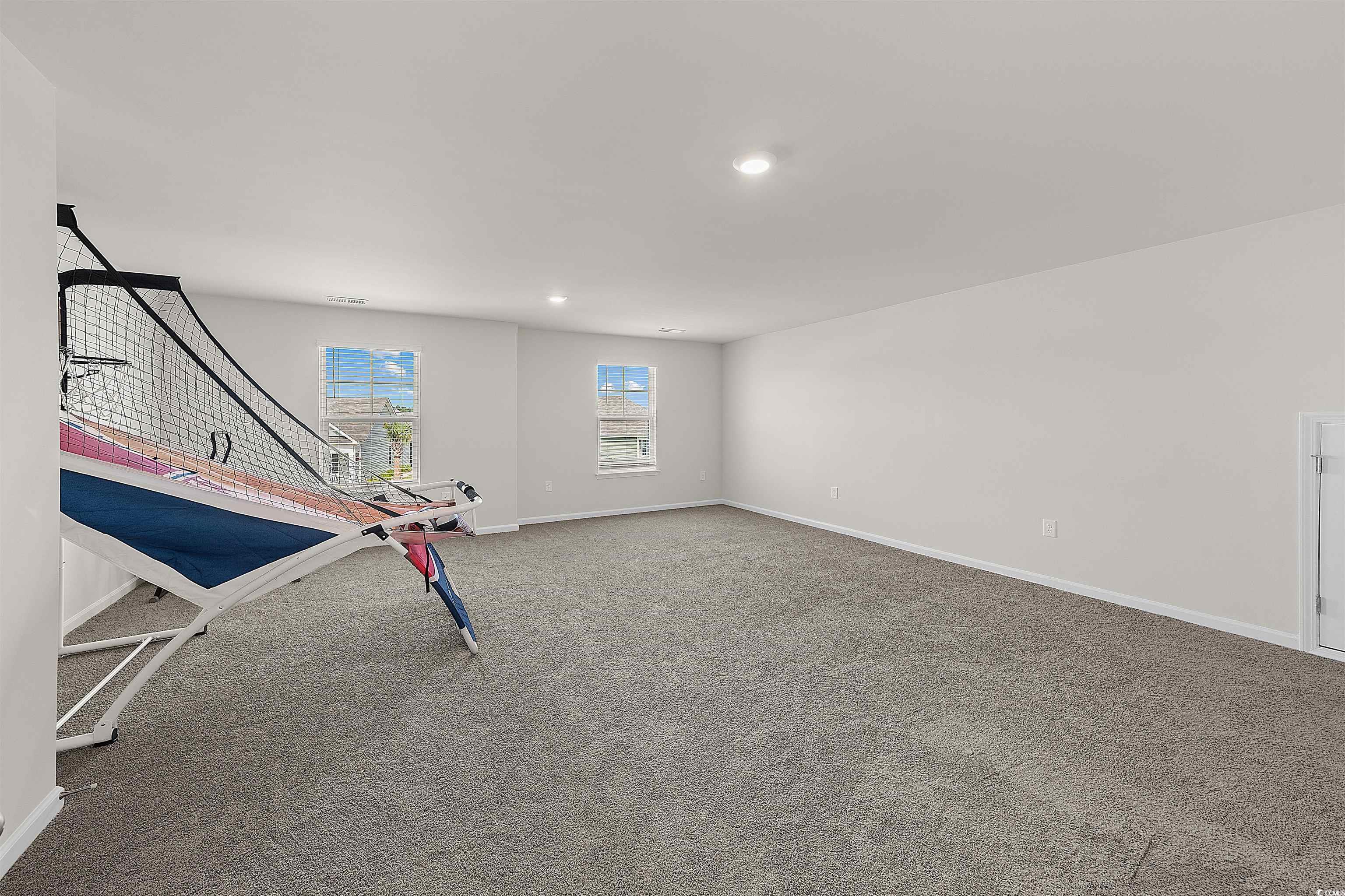3119 Fair Rdg Way Conway, SC 29526 - Photo 18 of 38 Basement with carpet and recessed lighting