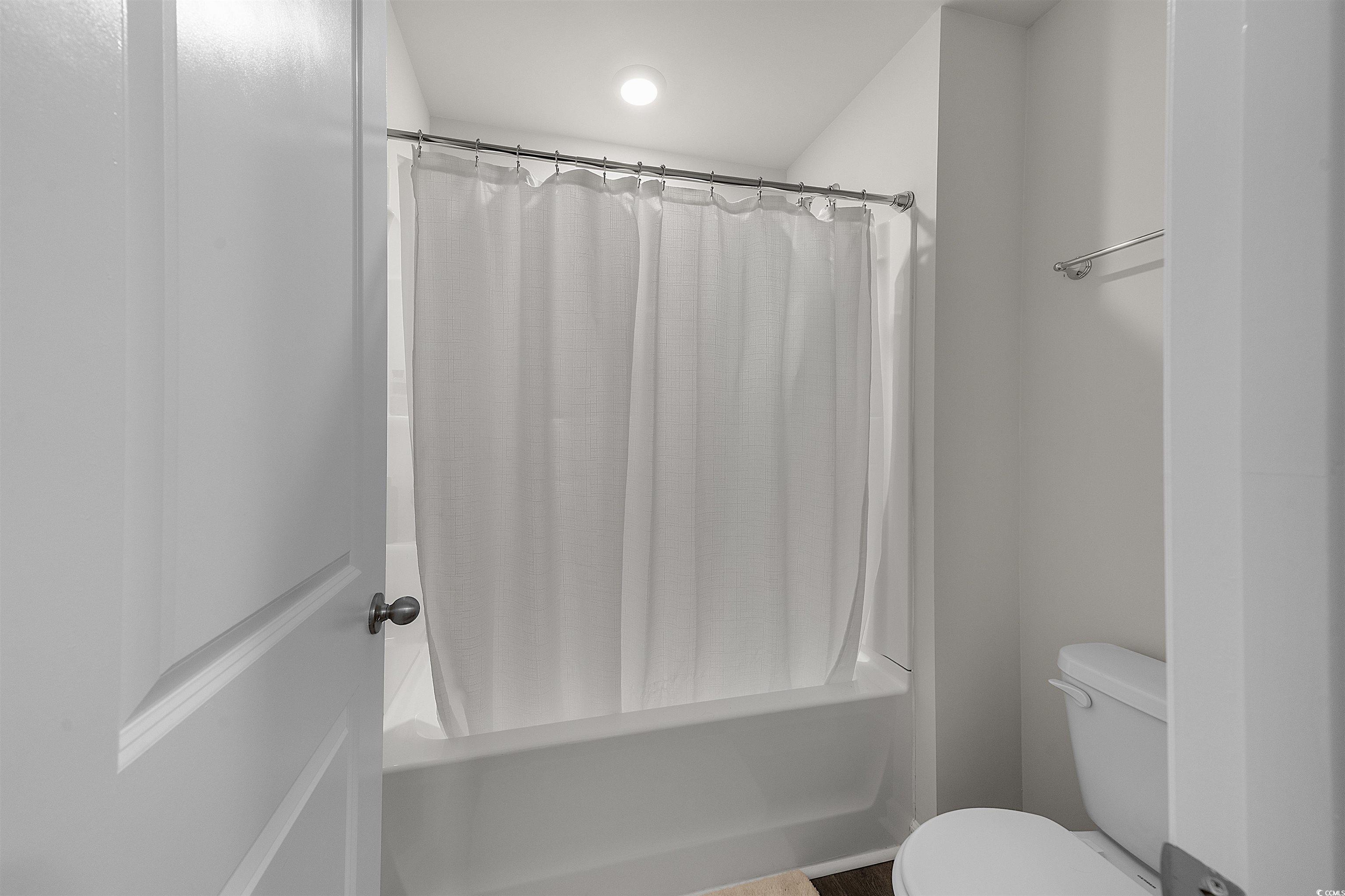 3119 Fair Rdg Way Conway, SC 29526 - Photo 20 of 38 Bathroom with shower / bath combination with curtain and toilet