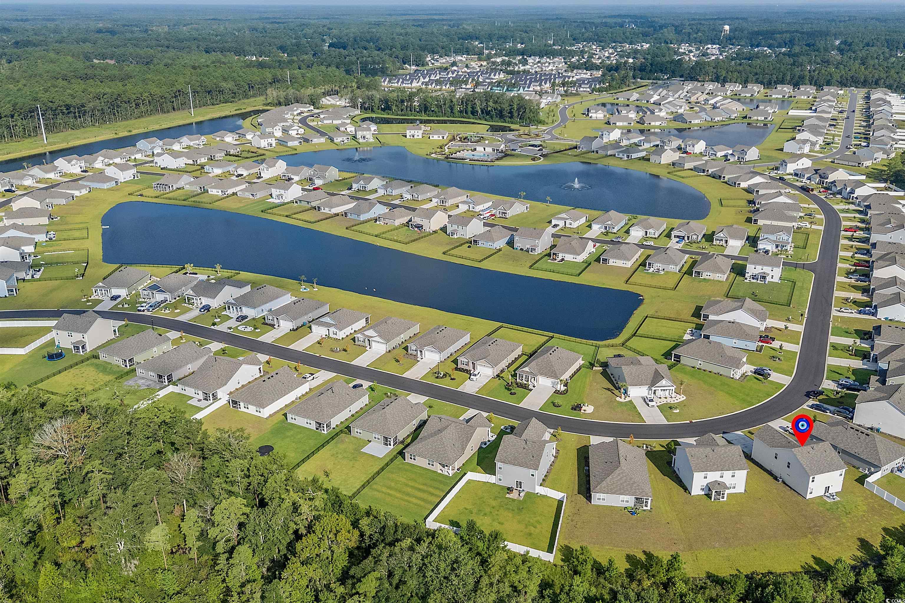 3119 Fair Rdg Way Conway, SC 29526 - Photo 31 of 38 Aerial view of property's location with nearby suburban area and a large body of water