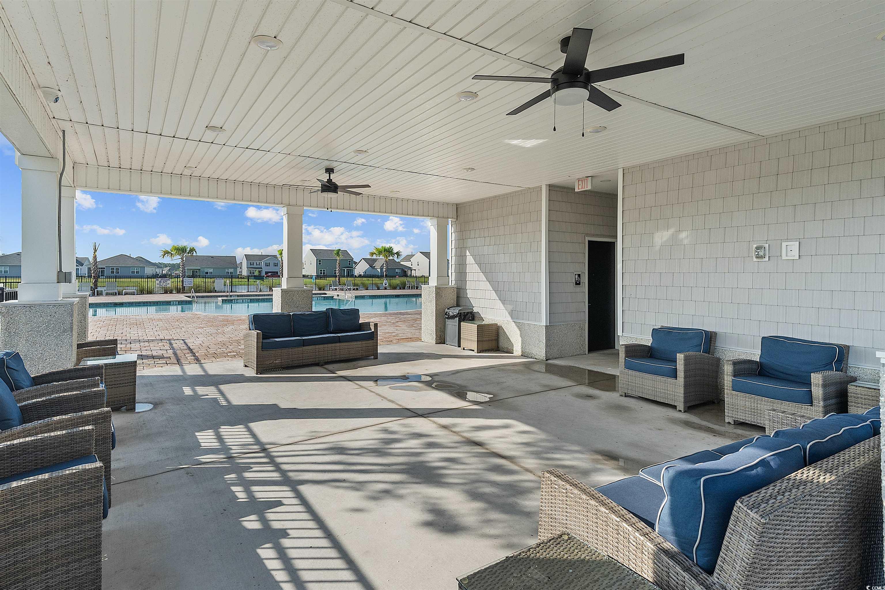 3119 Fair Rdg Way Conway, SC 29526 - Photo 33 of 38 View of patio / terrace with a ceiling fan, an outdoor hangout area, and a community pool