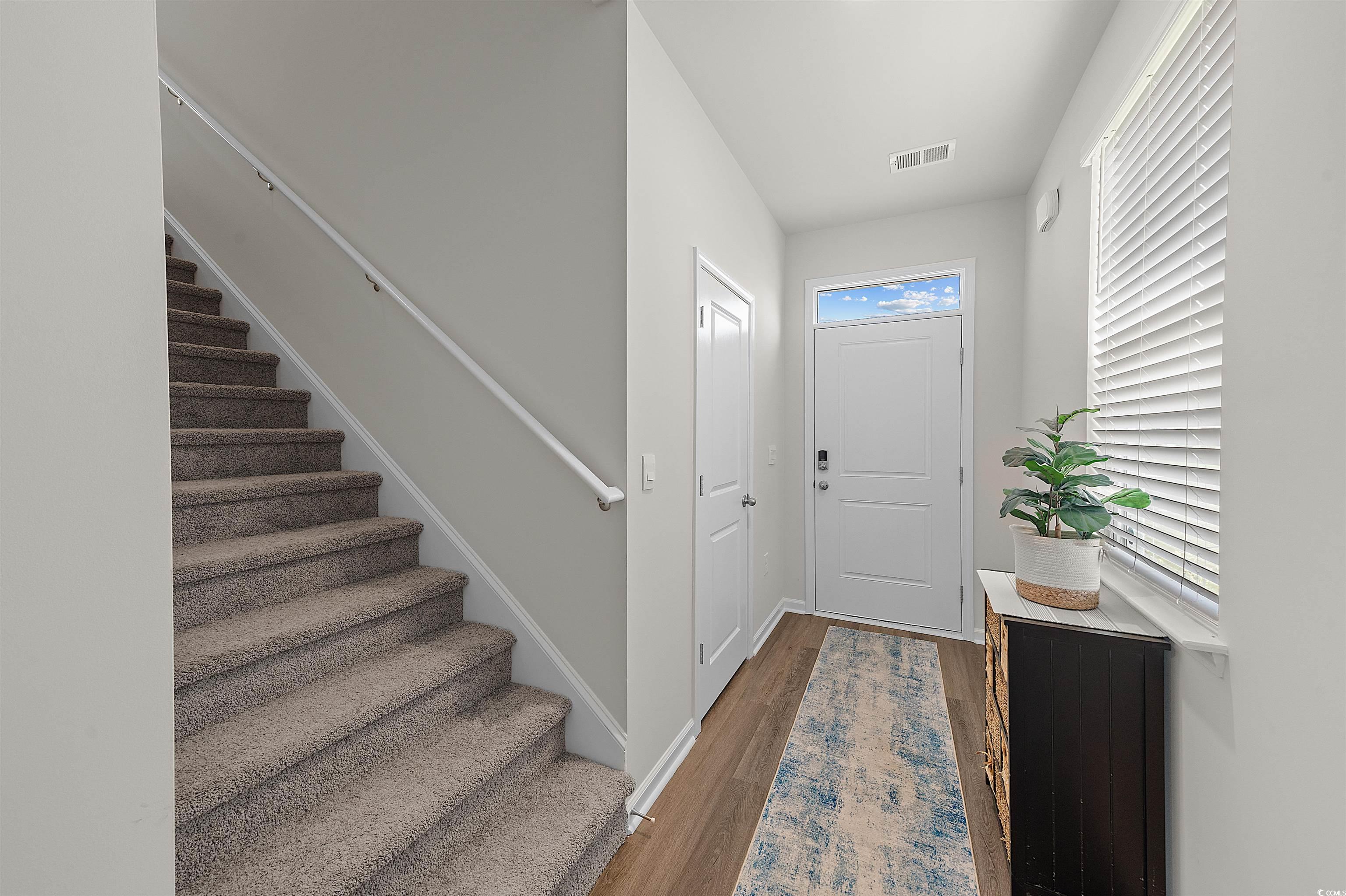 3119 Fair Rdg Way Conway, SC 29526 - Photo 4 of 38 Foyer entrance featuring stairs and wood finished floors