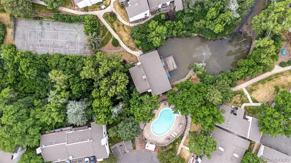 an aerial view of a house with outdoor space and street view