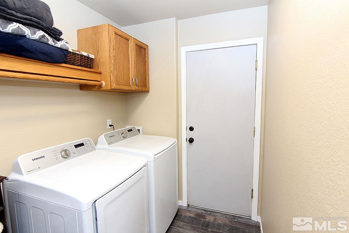 7762 Welsh Drive Reno, NV 89506 - Photo 12 of 25 a utility room with dryer and washer