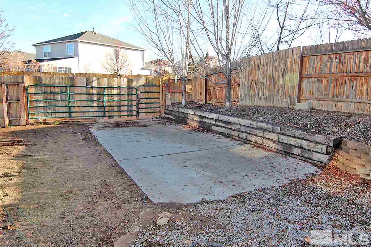 7762 Welsh Drive Reno, NV 89506 - Photo 24 of 25 a view of a entrance gate of a house