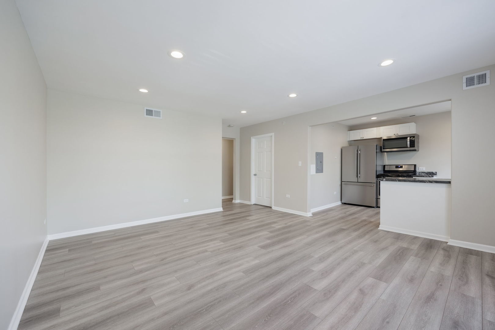 11933 South Pulaski Road, Unit 2 Alsip, IL 60803 - Photo 2 of 11 a view of kitchen with wooden floor