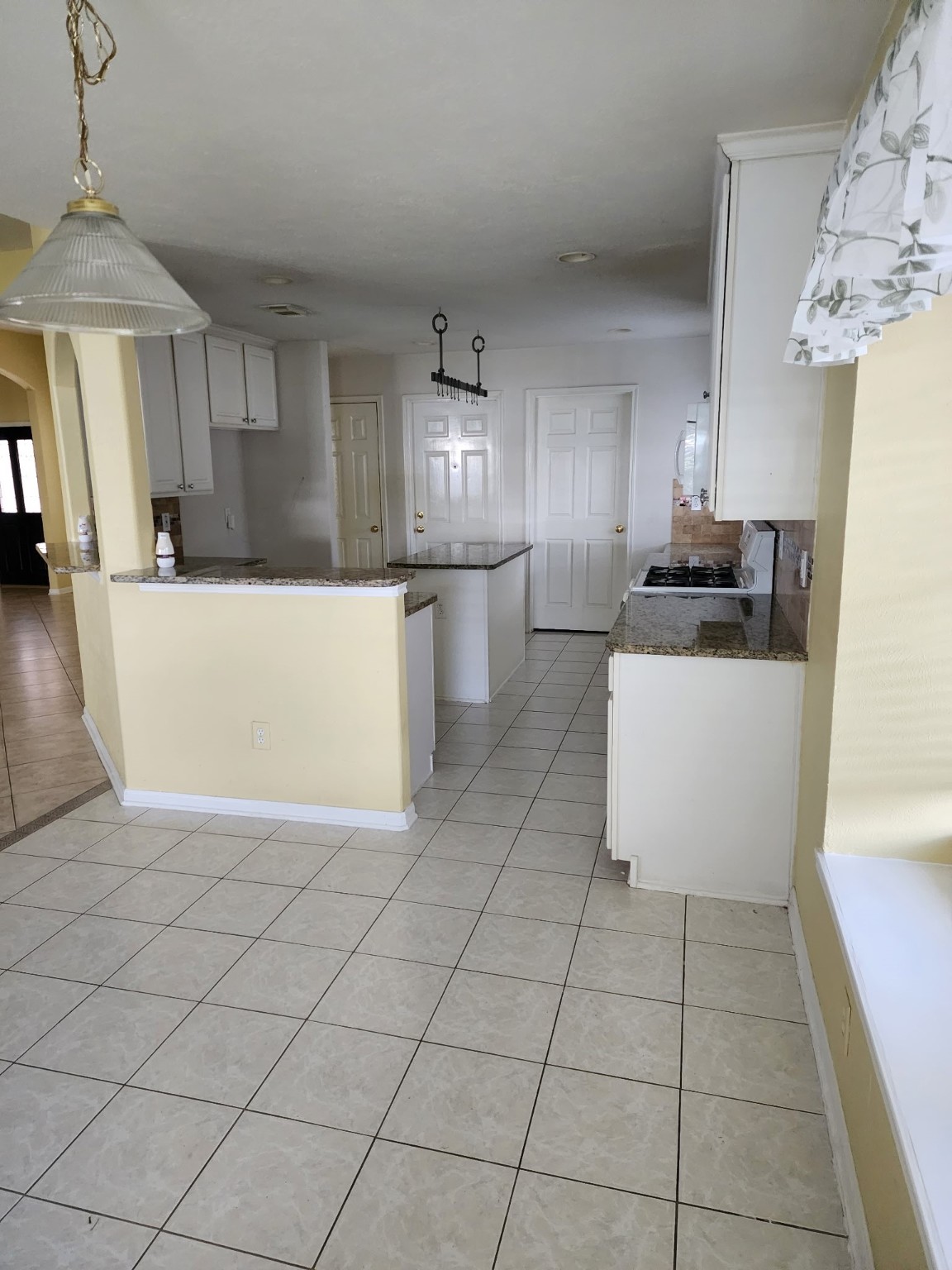 2314 Hannover Way Spring, TX 77388 - Photo 4 of 11 a kitchen with stainless steel appliances a refrigerator sink and microwave