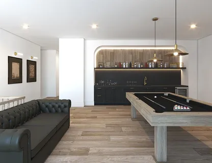 a living room with a couch and a ceiling fan