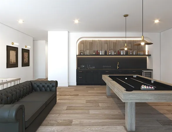 a living room with a couch and a ceiling fan