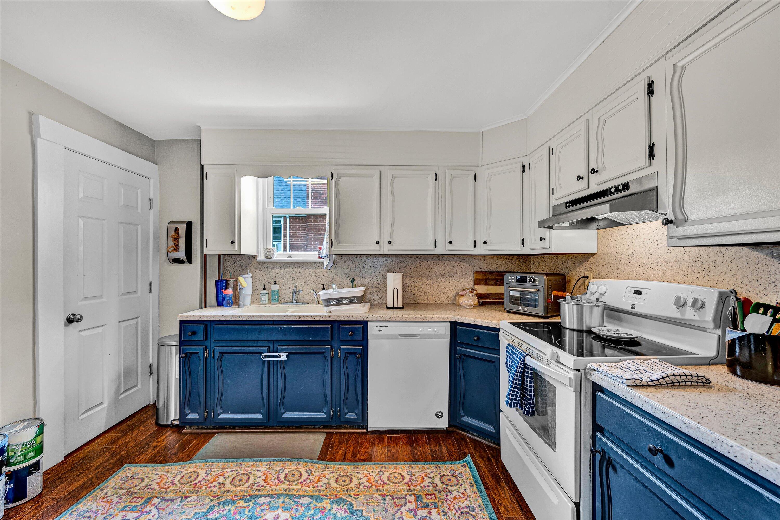 1907 Canterbury Road Southwest Roanoke, VA 24015 - Photo 11 of 36 a kitchen with stainless steel appliances granite countertop a sink and cabinets