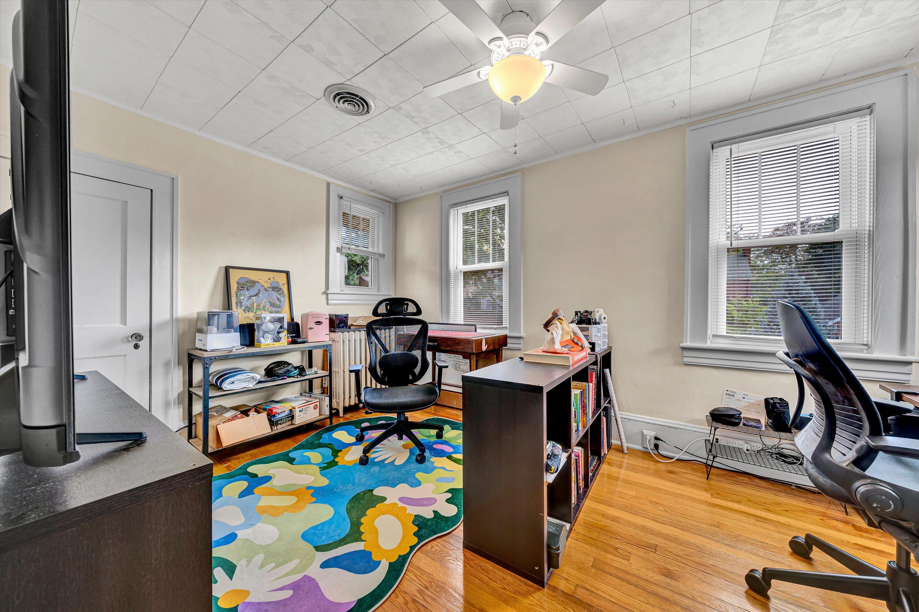 1907 Canterbury Road Southwest Roanoke, VA 24015 - Photo 20 of 36 a view of a workspace with furniture and a window