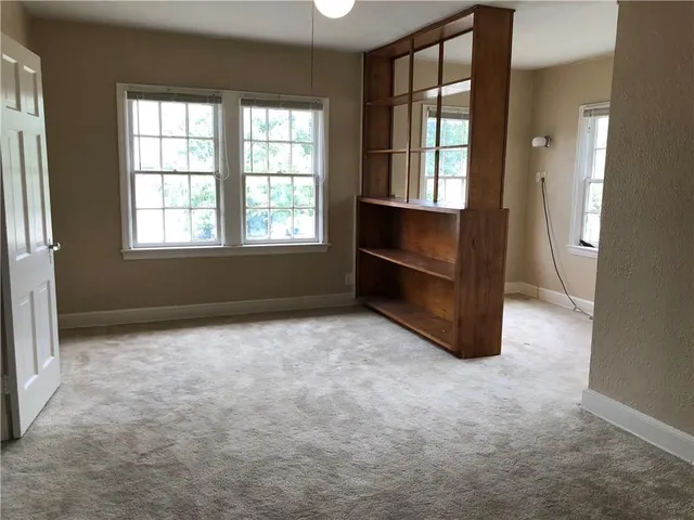 an empty room with windows