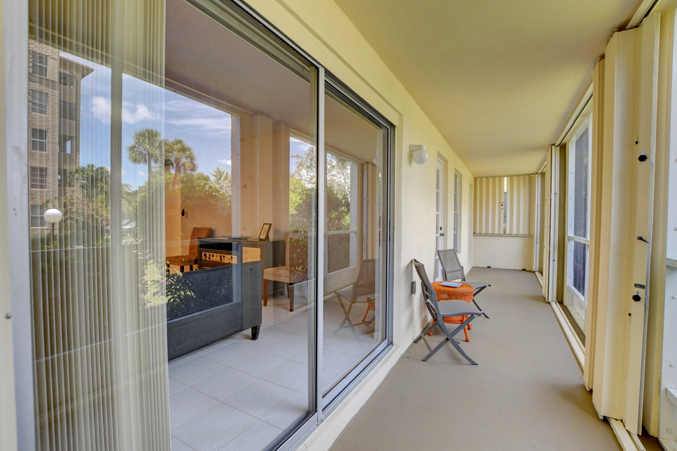 951 De Soto Road, Unit 127 Boca Raton, FL 33432 - Photo 14 of 26 Large Covered Screened-In Patio