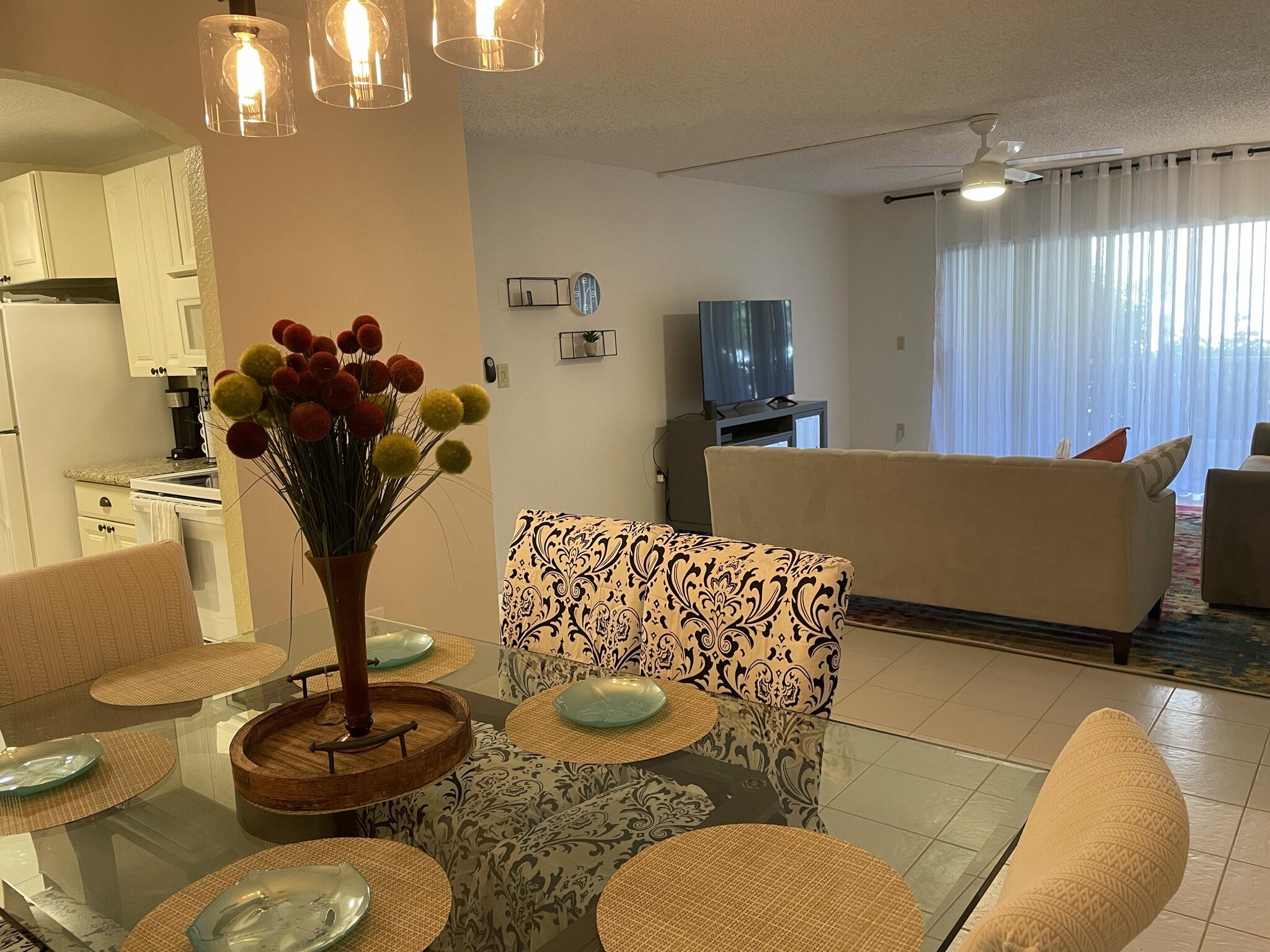 951 De Soto Road, Unit 127 Boca Raton, FL 33432 - Photo 10 of 26 Dining Open to Living Area