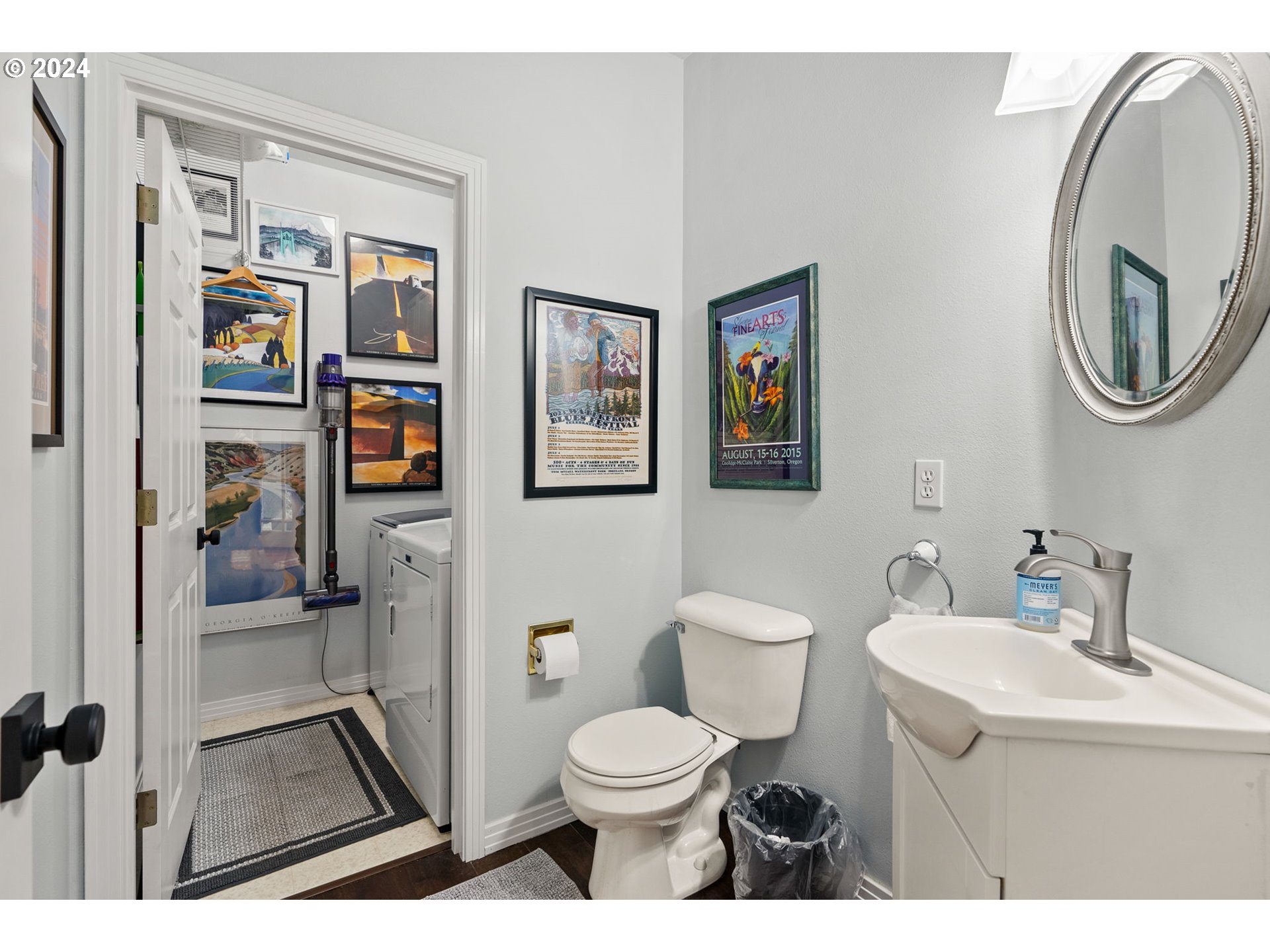 22225 Chelan Loop West Linn, OR 97068 - Photo 18 of 46 a bathroom with a toilet a sink and a mirror