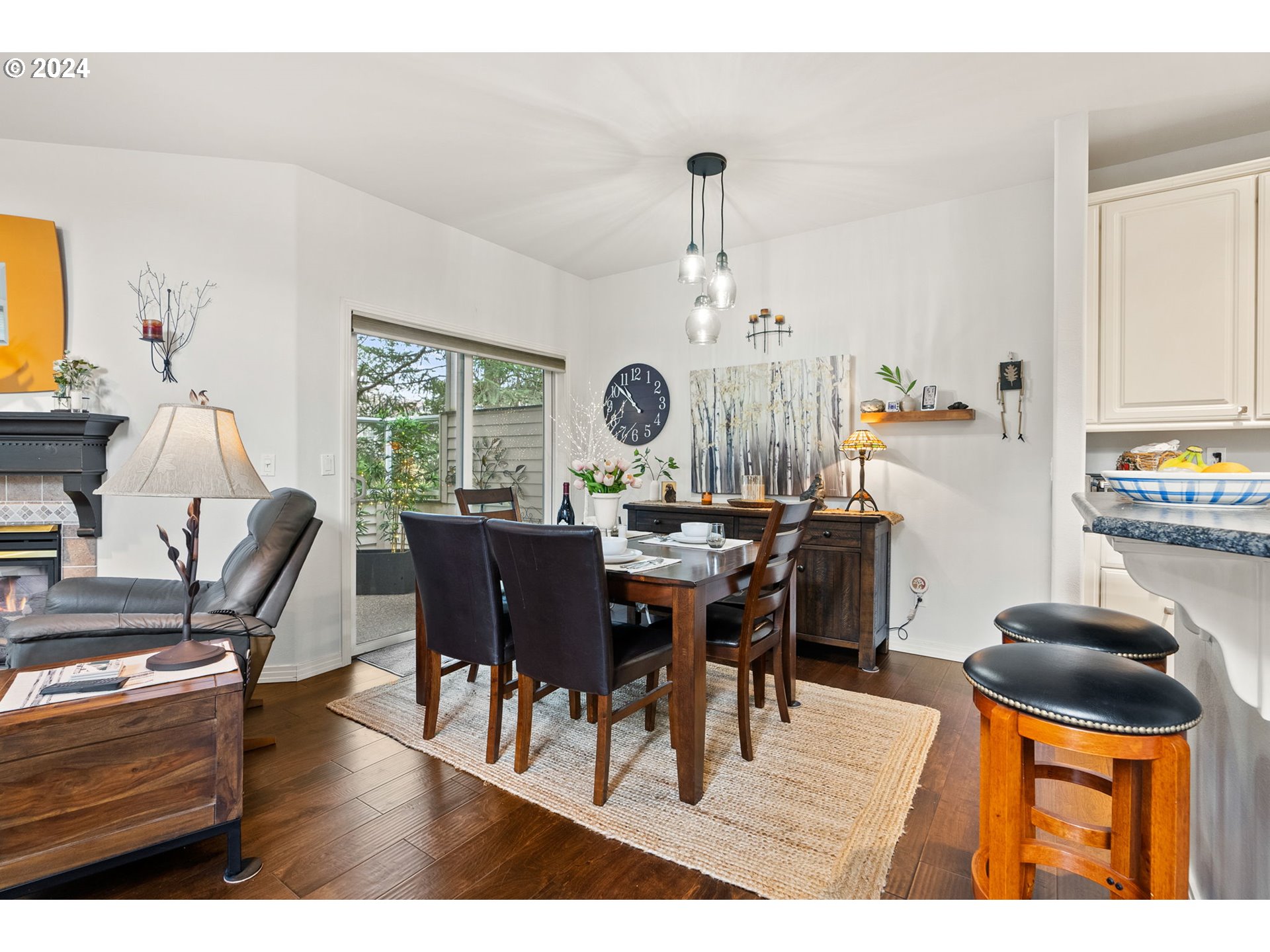 22225 Chelan Loop West Linn, OR 97068 - Photo 27 of 46 a view of a dining room with furniture and chandelier