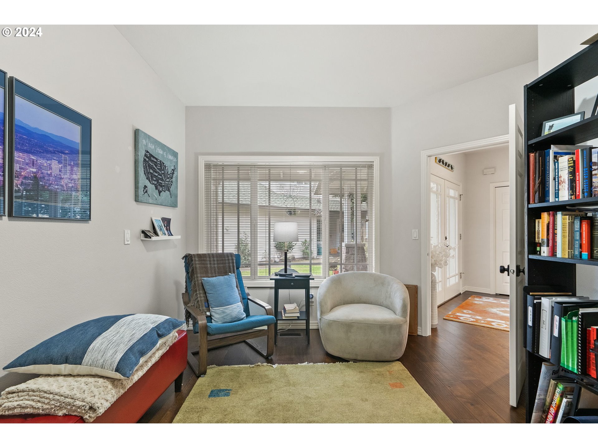 22225 Chelan Loop West Linn, OR 97068 - Photo 31 of 46 a living room with furniture and a flat screen tv