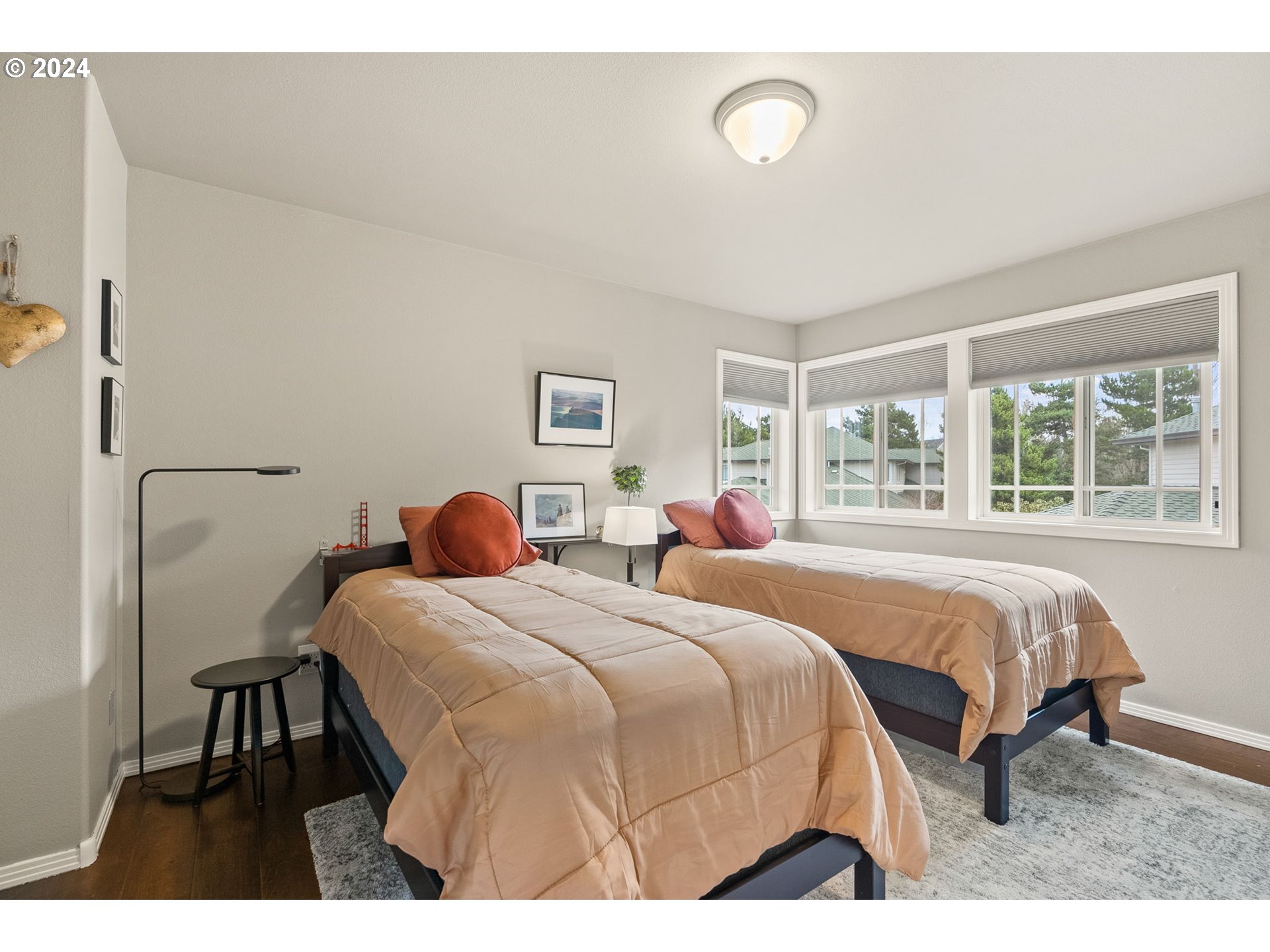 22225 Chelan Loop West Linn, OR 97068 - Photo 32 of 46 a bedroom with a bed and a large window