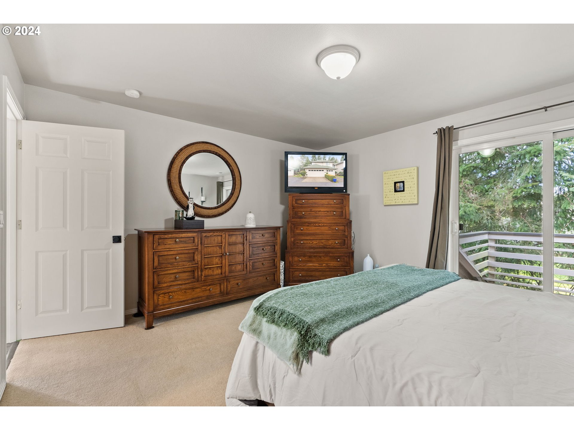 22225 Chelan Loop West Linn, OR 97068 - Photo 46 of 46 a bedroom with a bed and a dresser